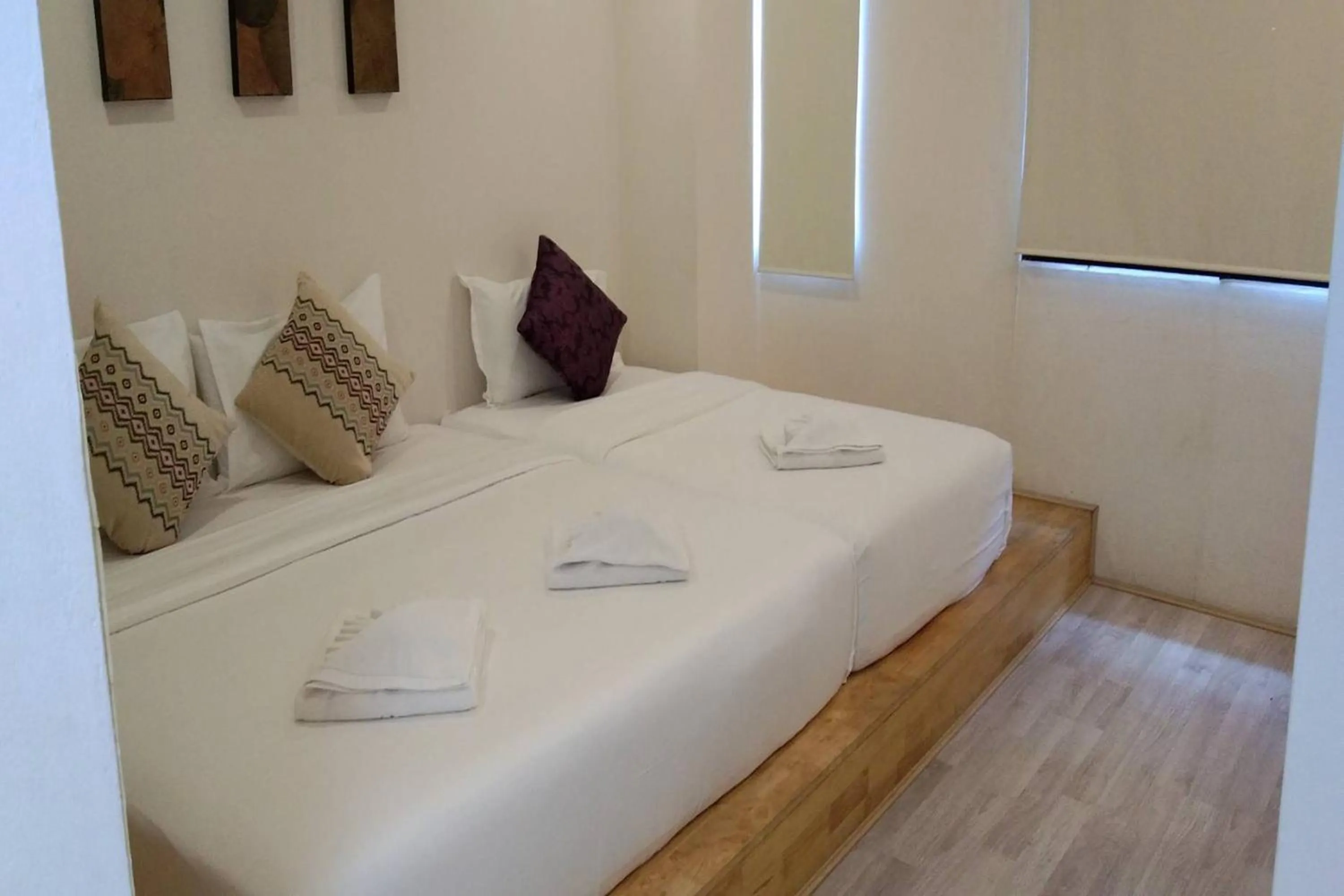 Bed in The Guest Arak Boutique Hotel