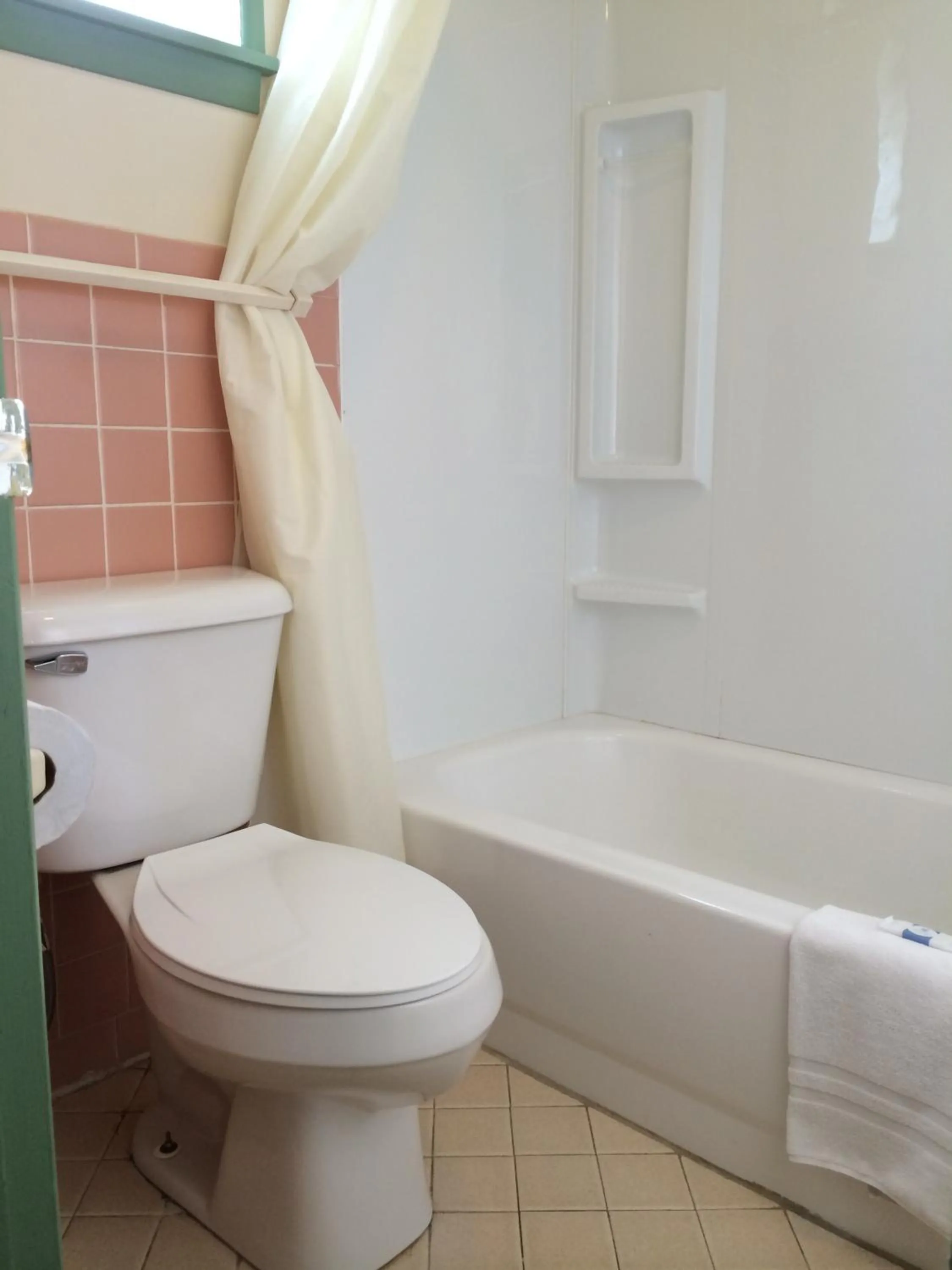 Toilet in Super 7 Motel