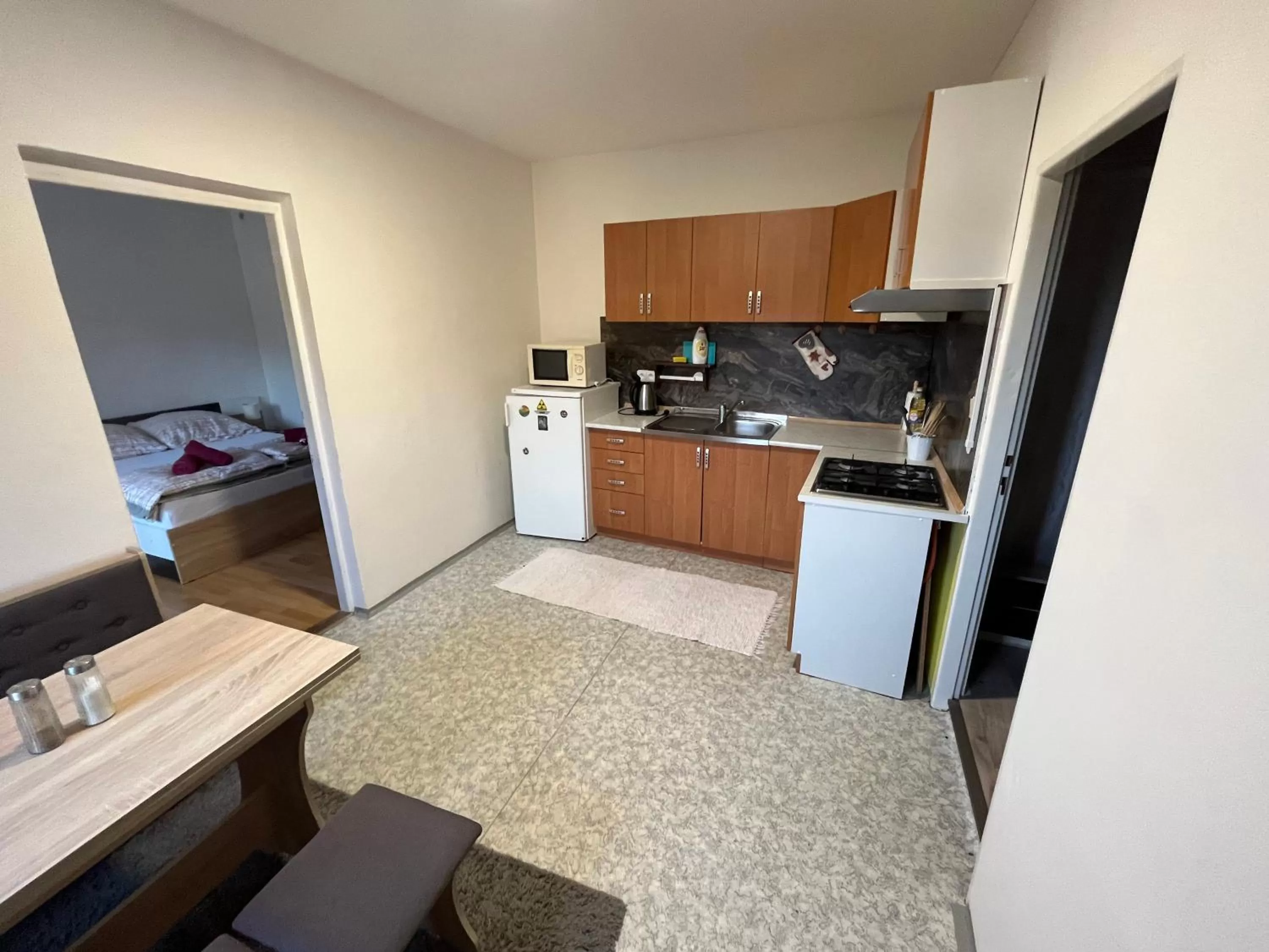 Kitchen or kitchenette in H@M Penzion