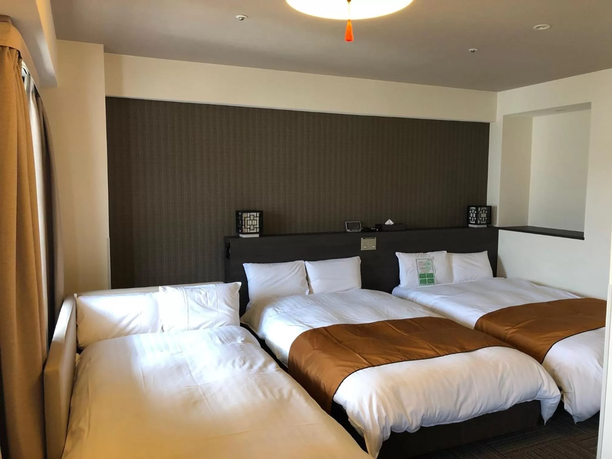 Bed in Dormy Inn Nagasaki Shinchichukagai