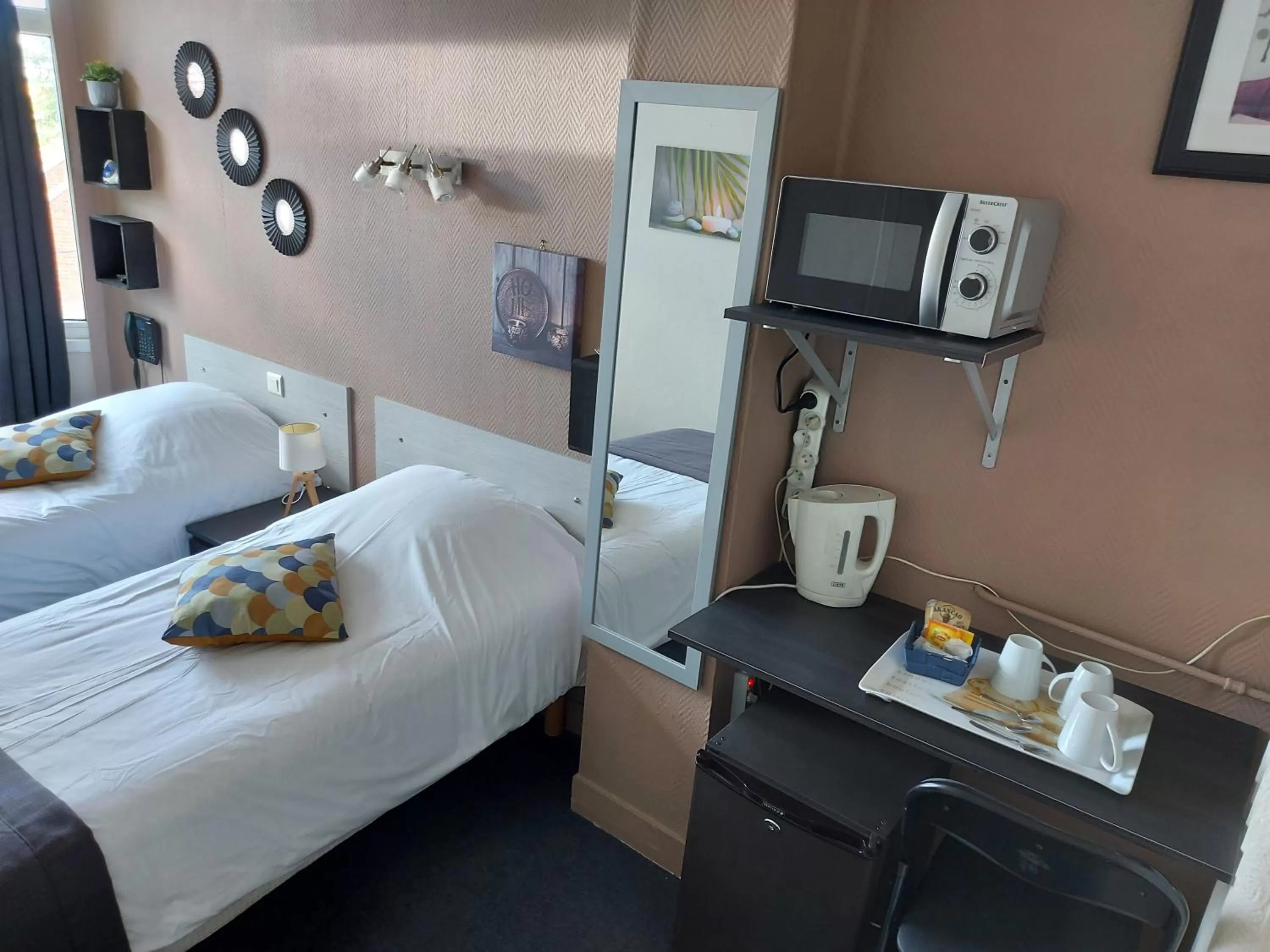 Bed in Hotel De La Paix