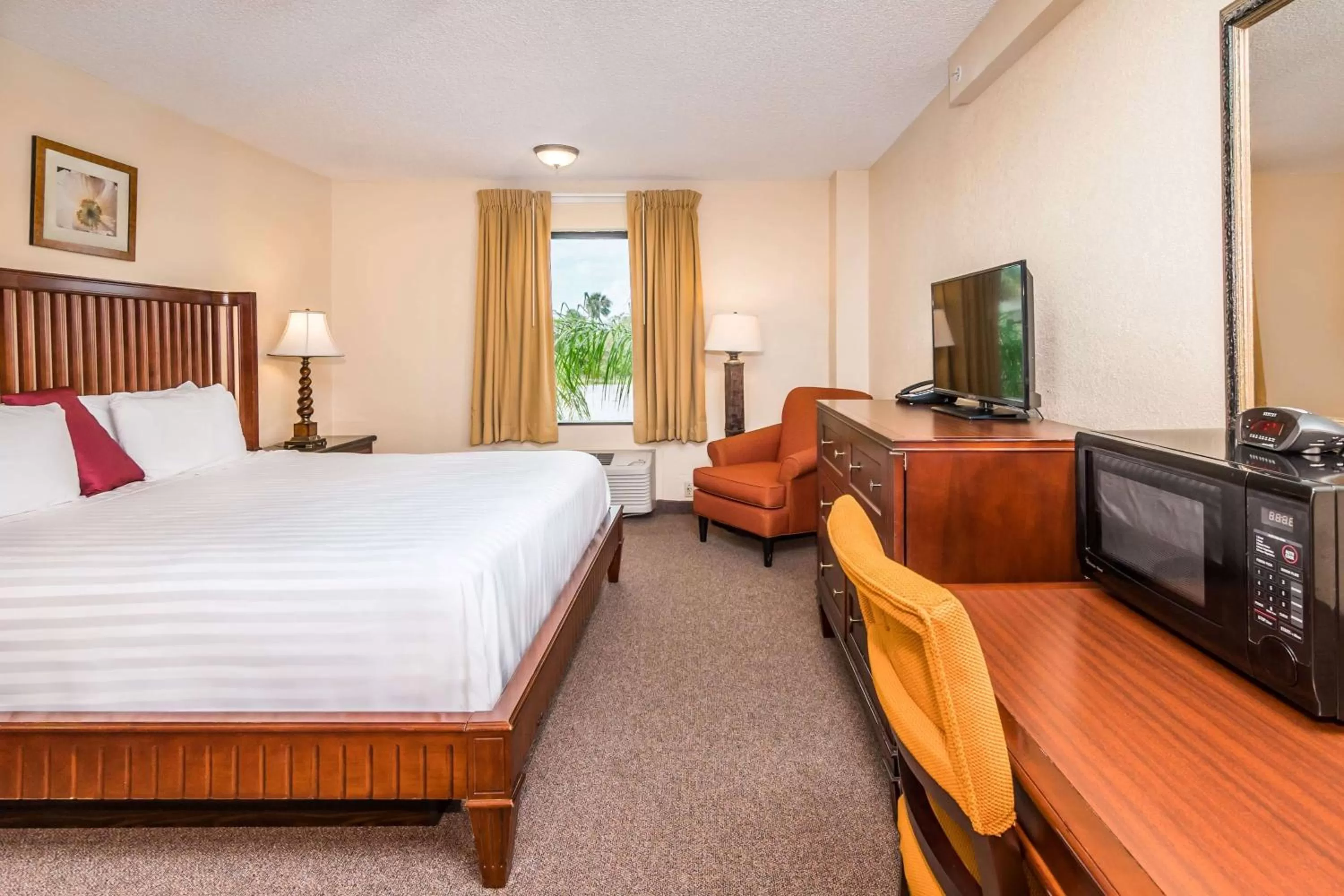 Photo of the whole room, Bed in Days Inn & Suites by Wyndham Lake Okeechobee