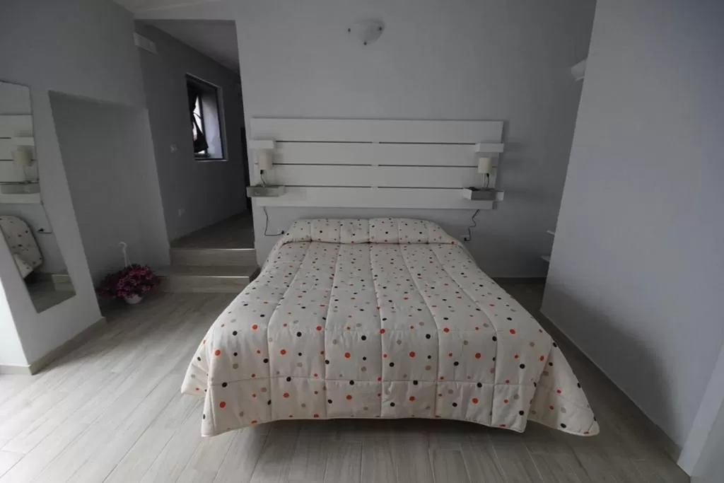 Bedroom, Bed in Locazione Turistica Domus Re