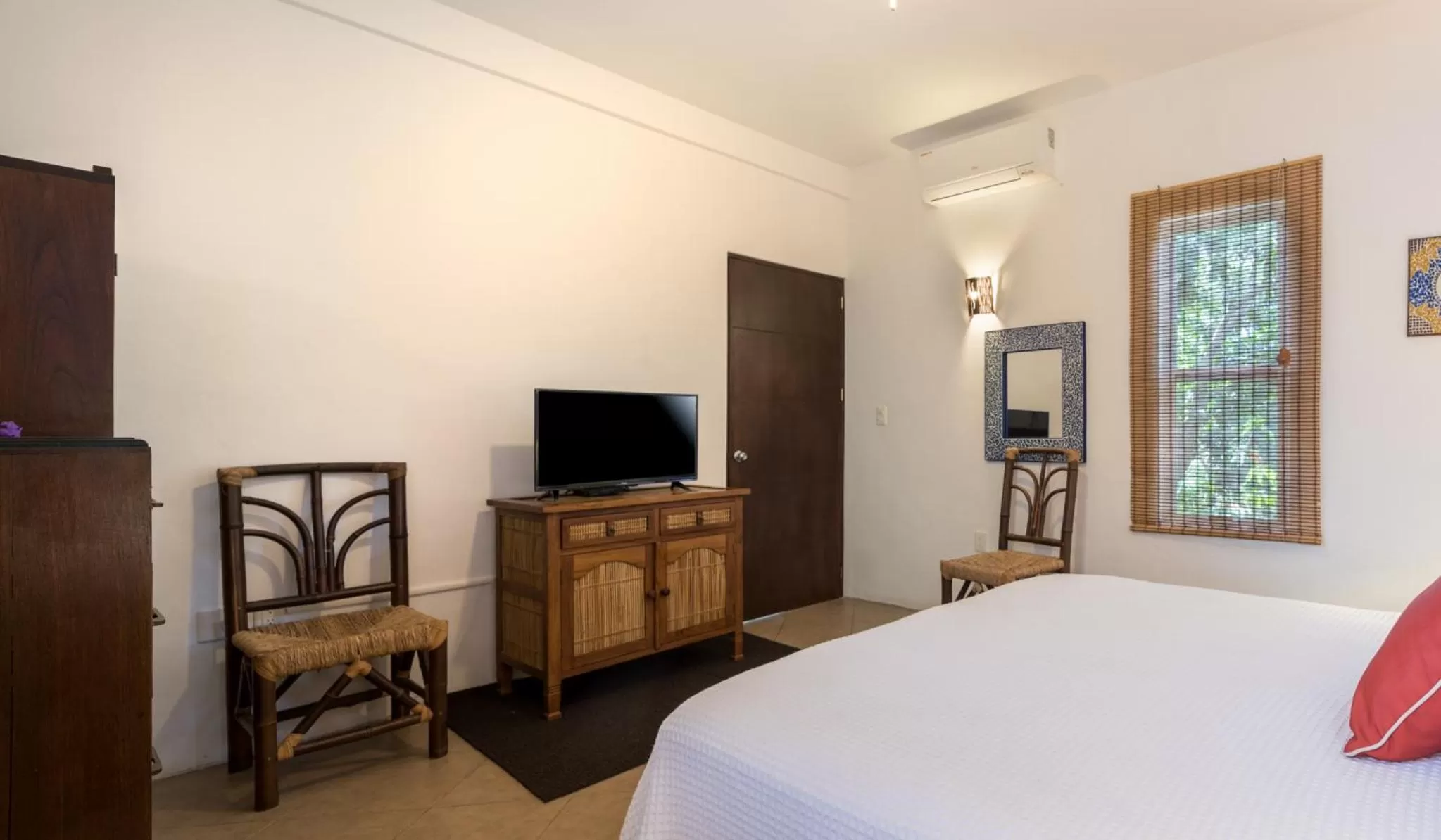 Bed in Villas El Encanto Cozumel