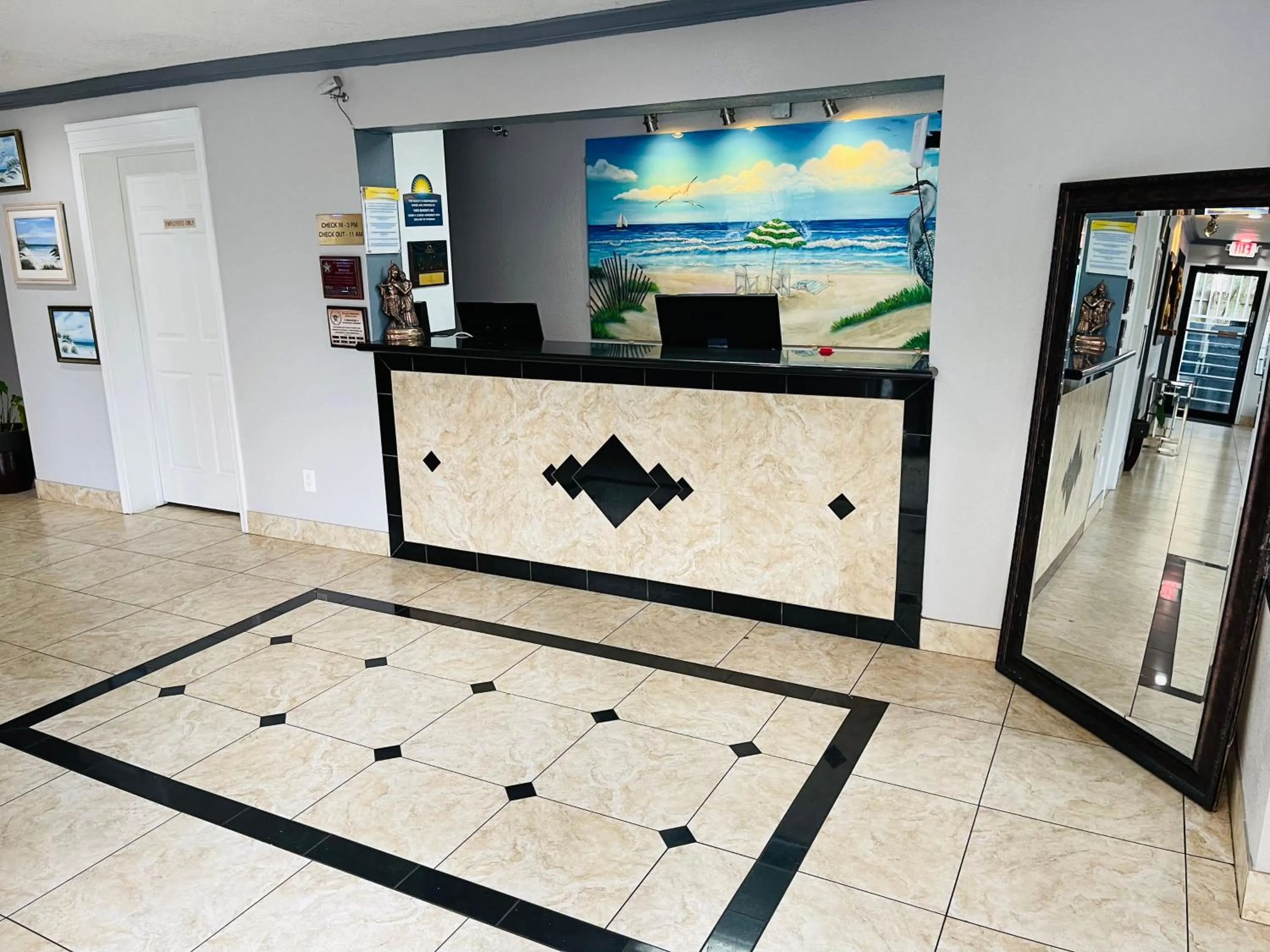 Lobby or reception in Days Inn by Wyndham Fort Walton Beach