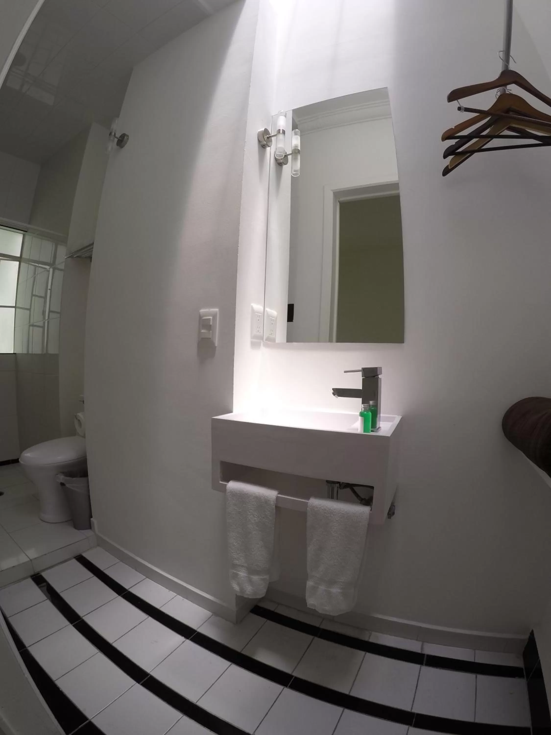 Bathroom in Distrito Condesa Rooms and Studios