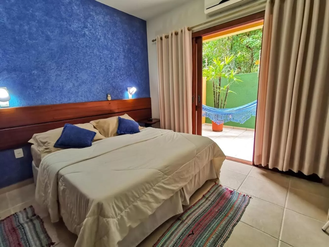 Bed in Pousada Ilha dos Anjos