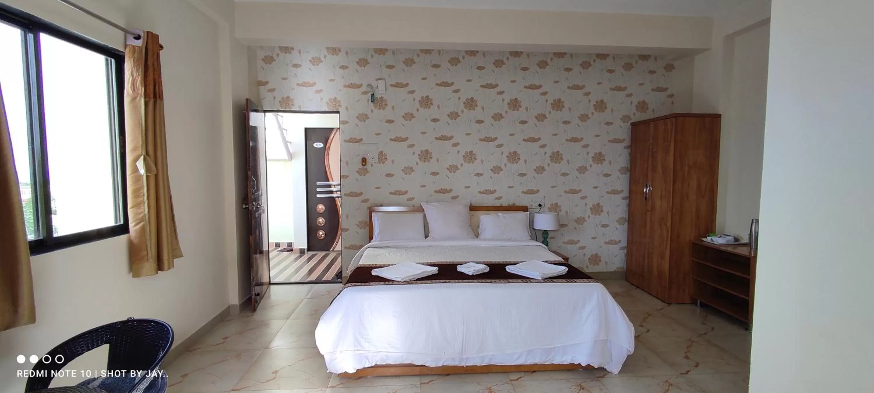 Bed in Mango Valley Resort Ganpatipule