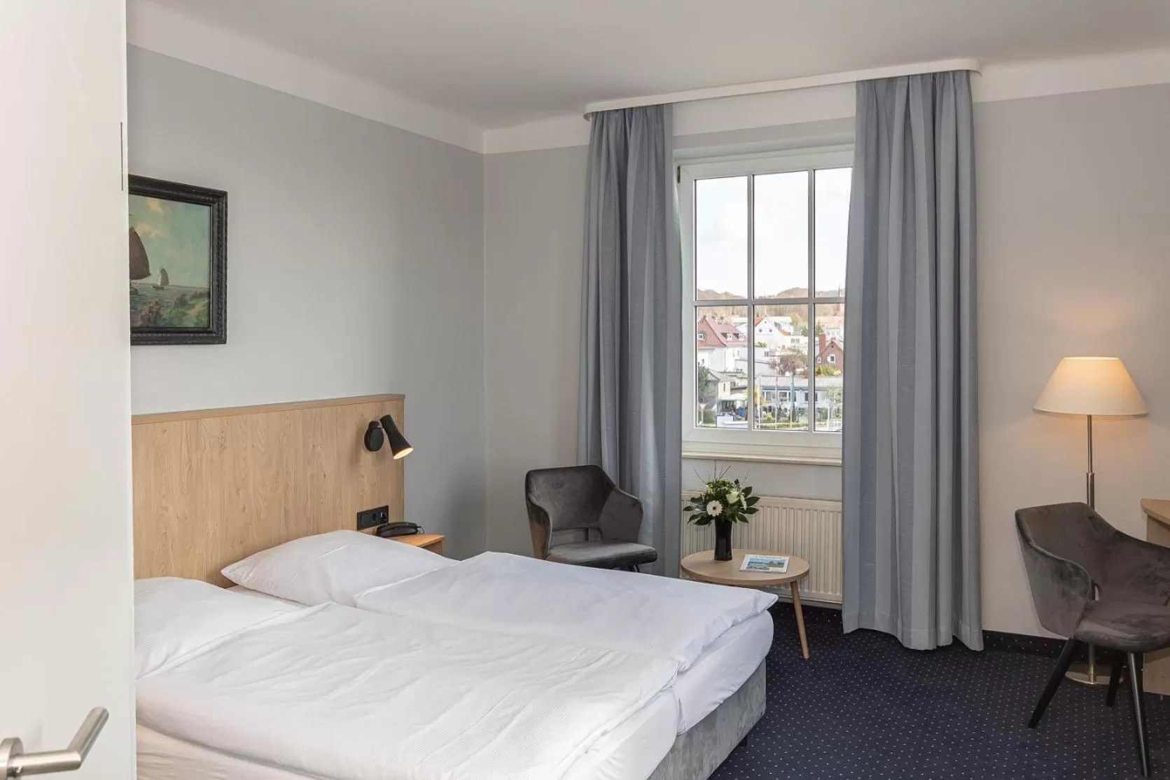 Photo of the whole room, Bed in Kurhotel Sassnitz