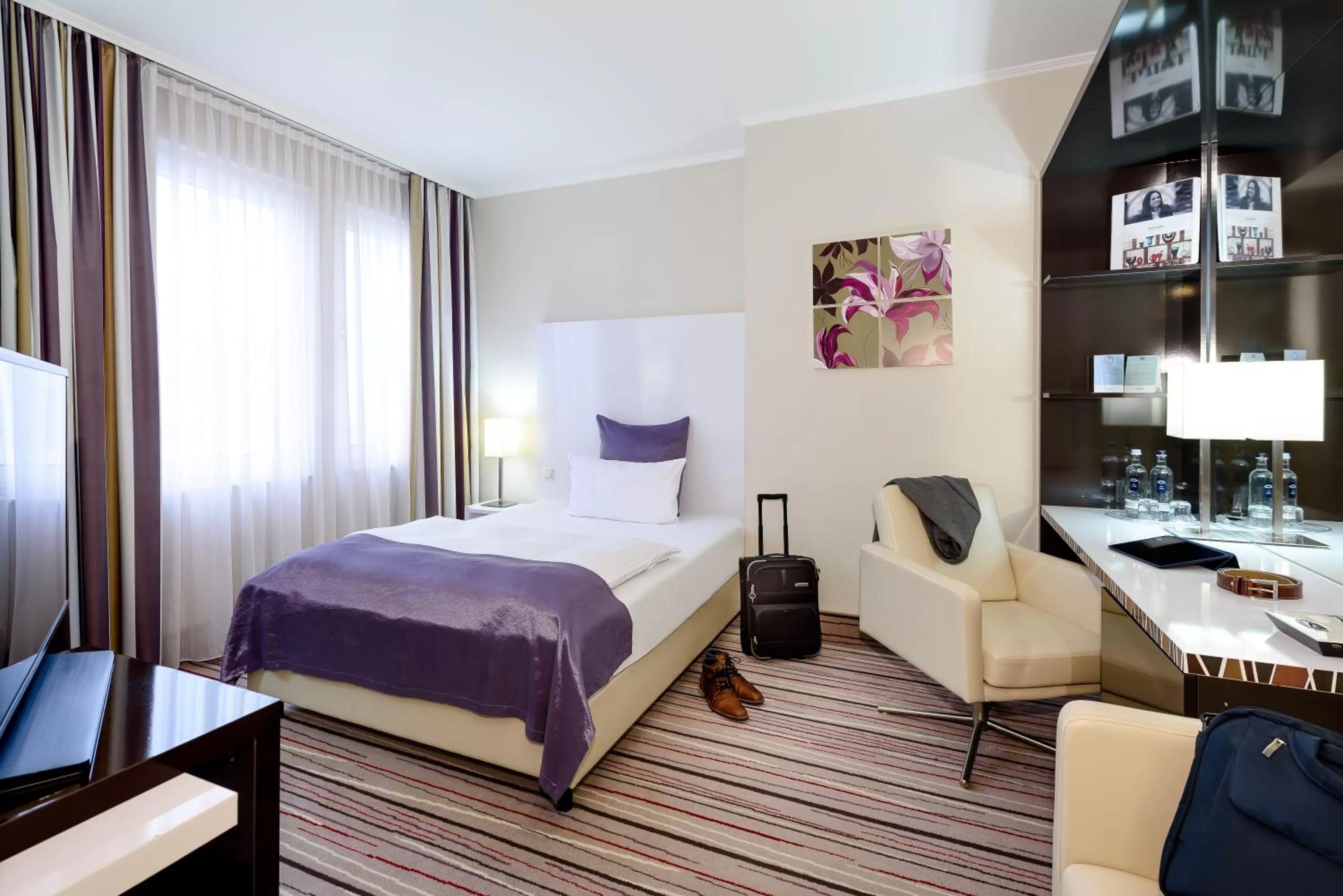 Photo of the whole room, Bed in Mercure Hotel Wiesbaden City