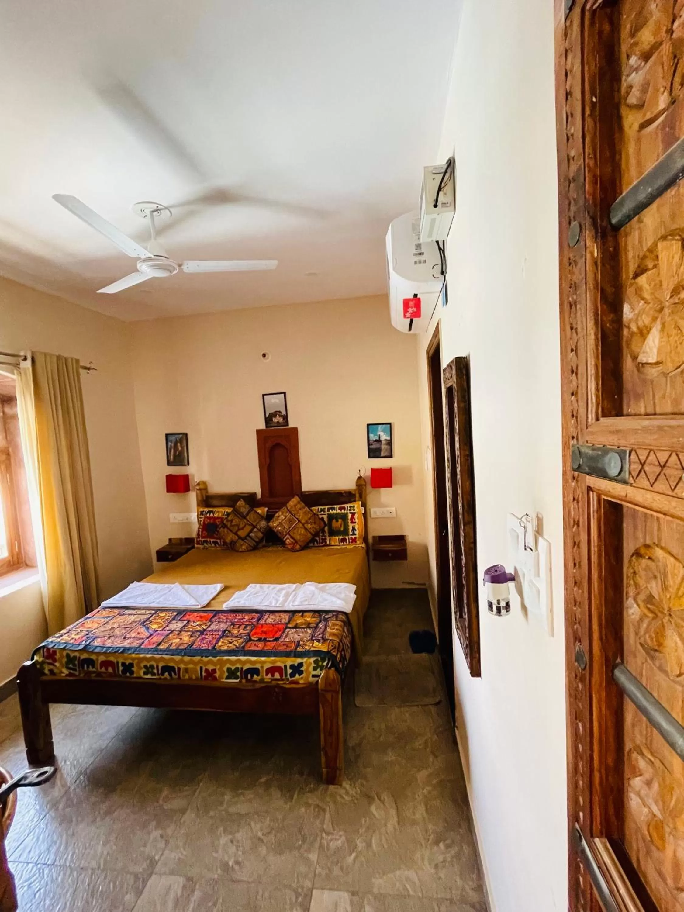 Photo of the whole room, Bed in Corsican Haveli