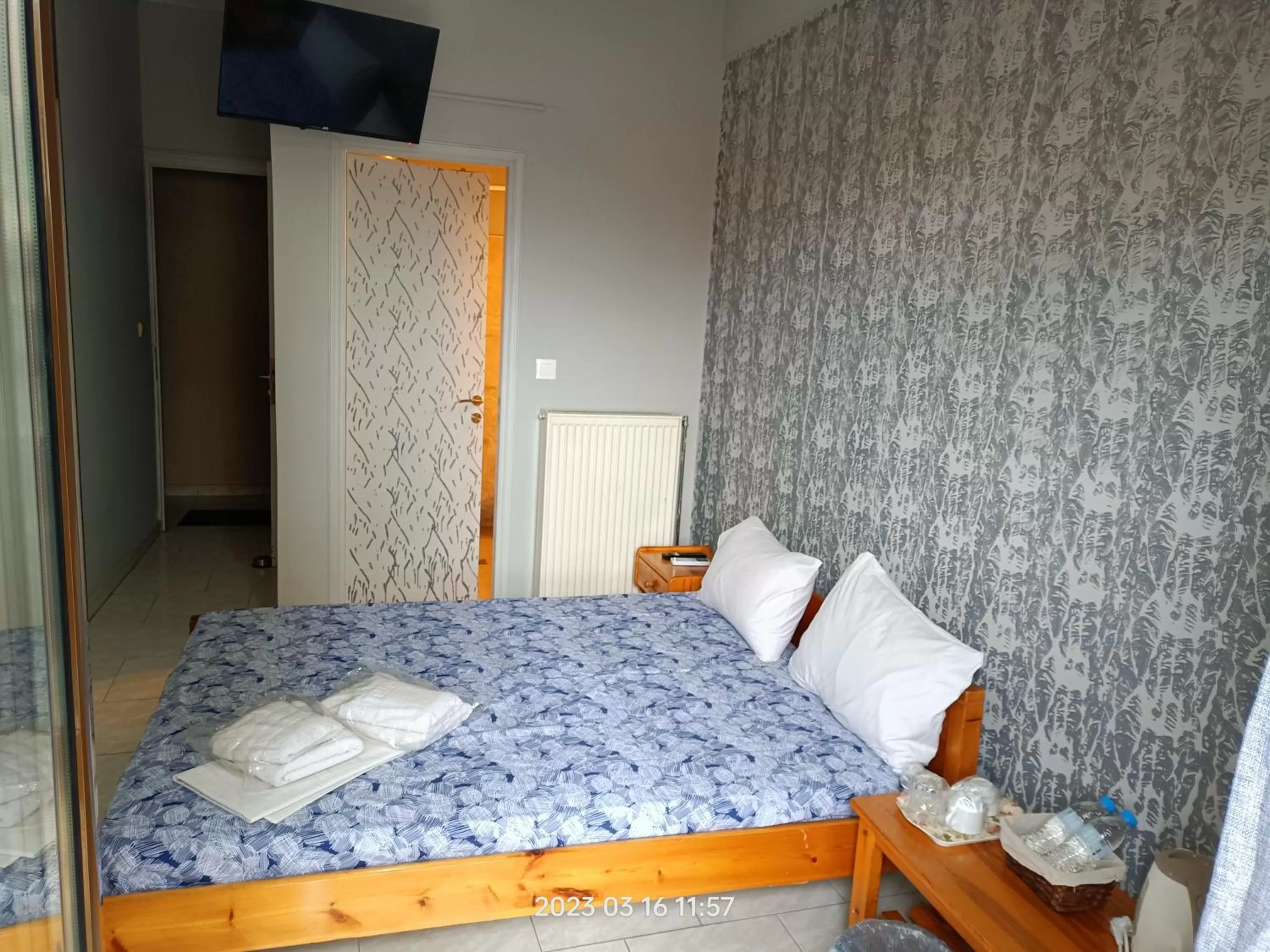 Bed in Georgios Rooms