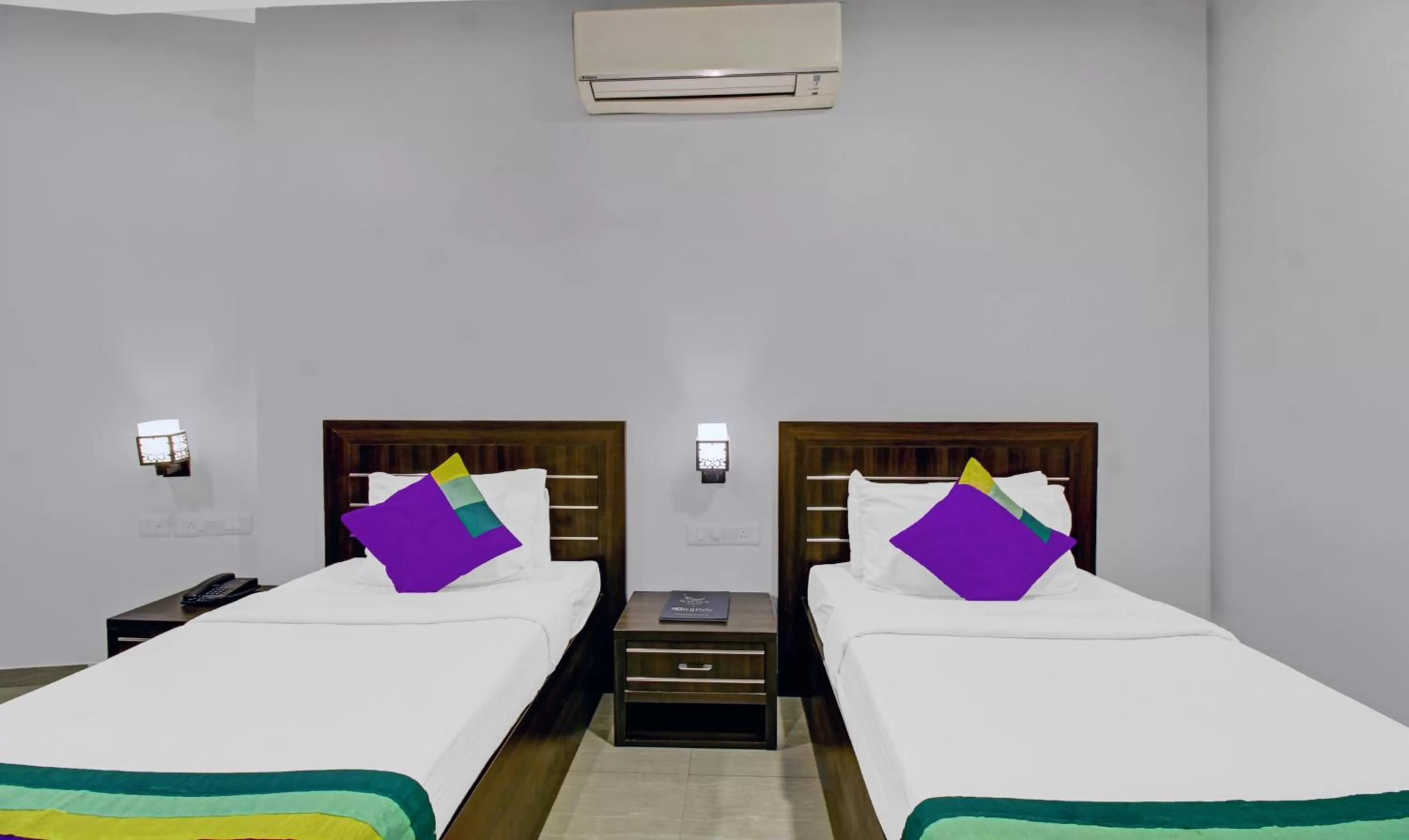 Bedroom, Bed in Treebo Premium Brijinn