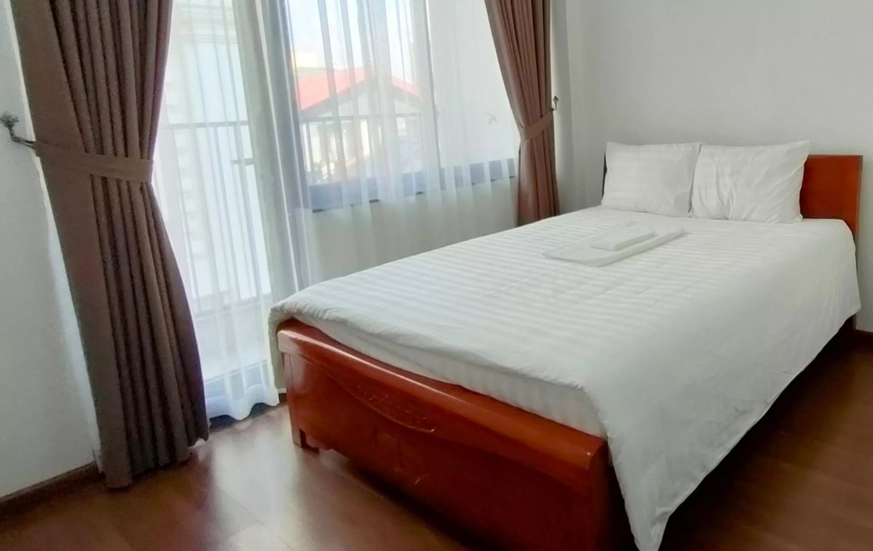 Bed in Era Apartment Đông Các