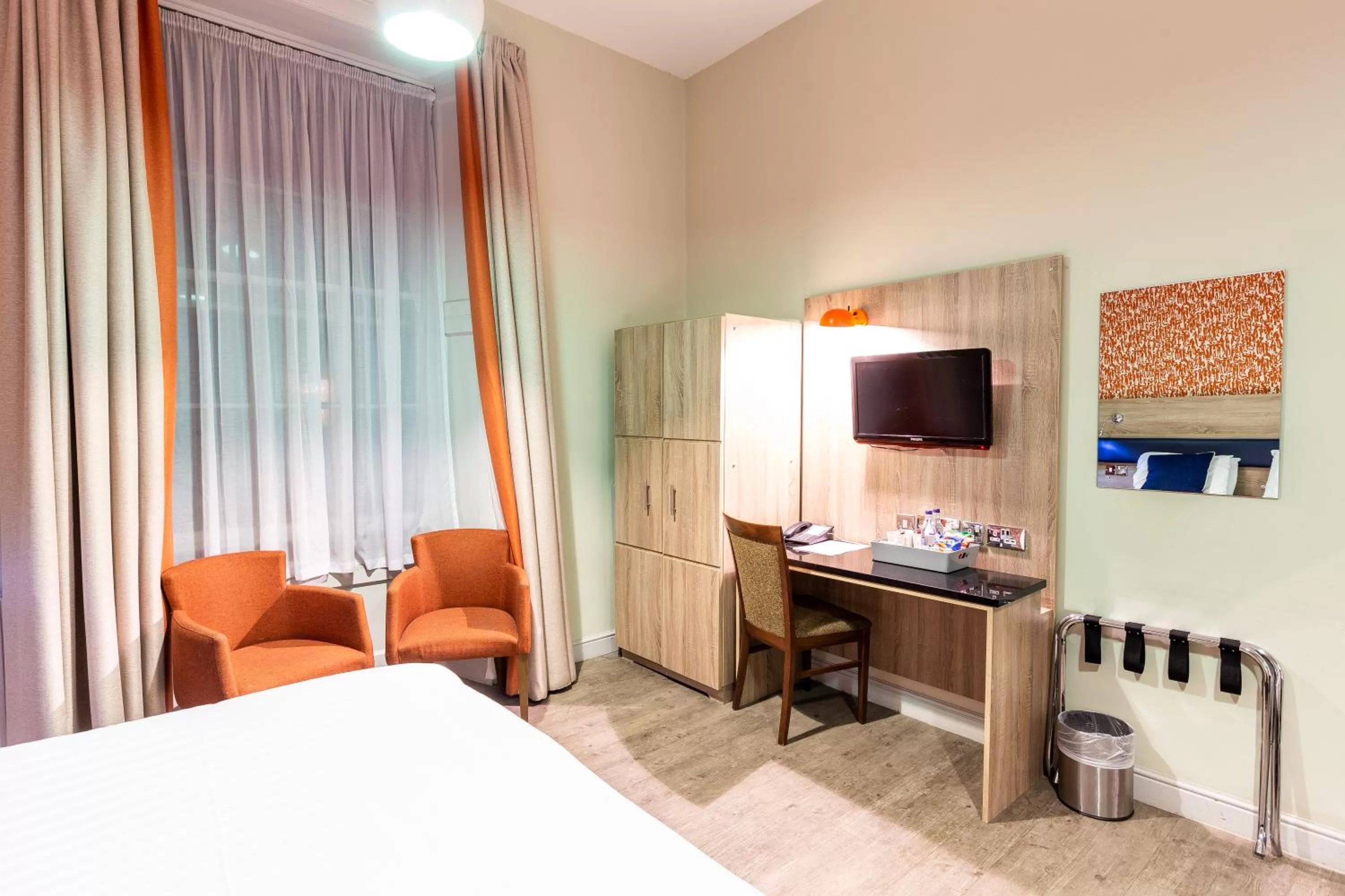 Bed in Cairn Hotel & Apartments