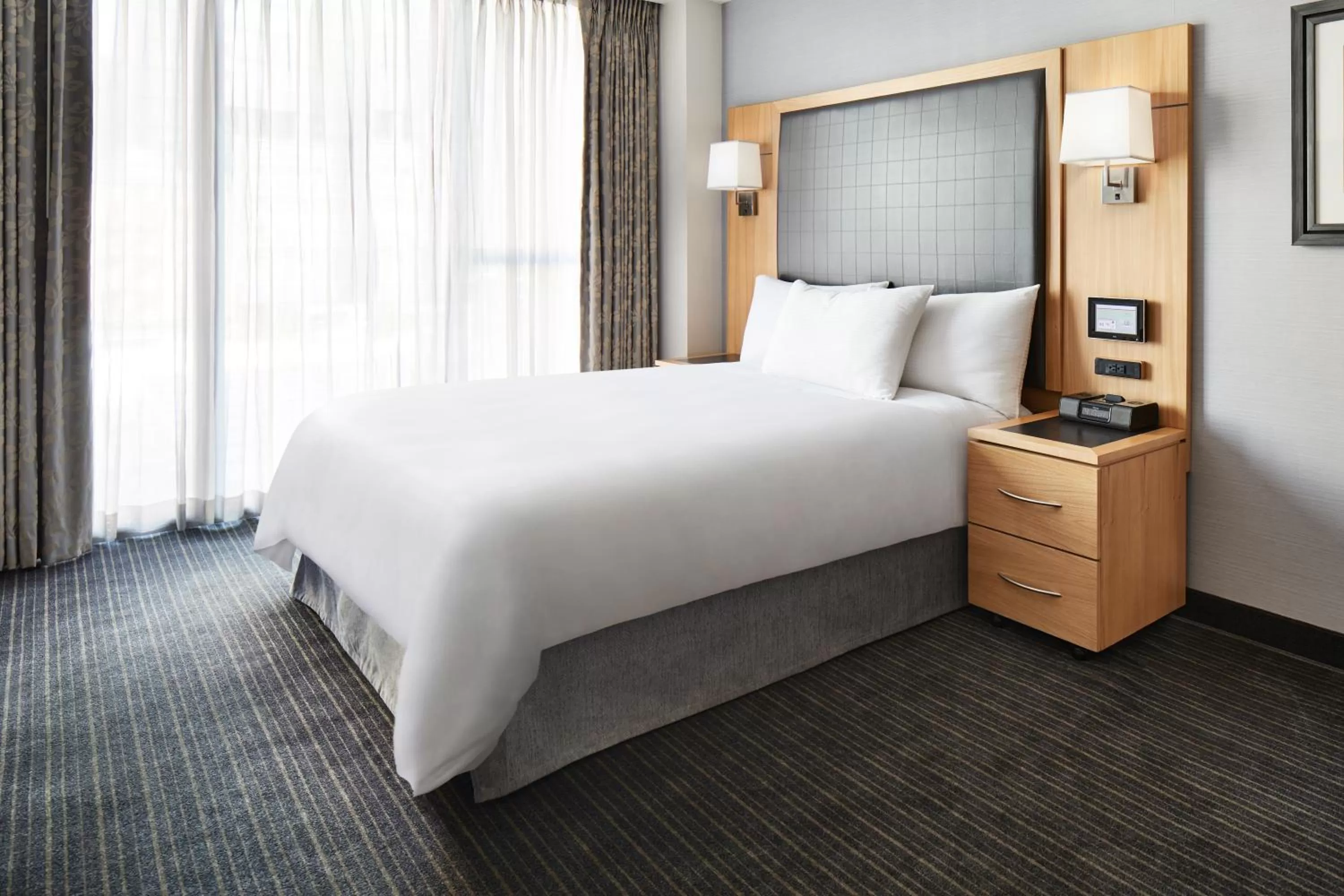 Bed in World Center Hotel