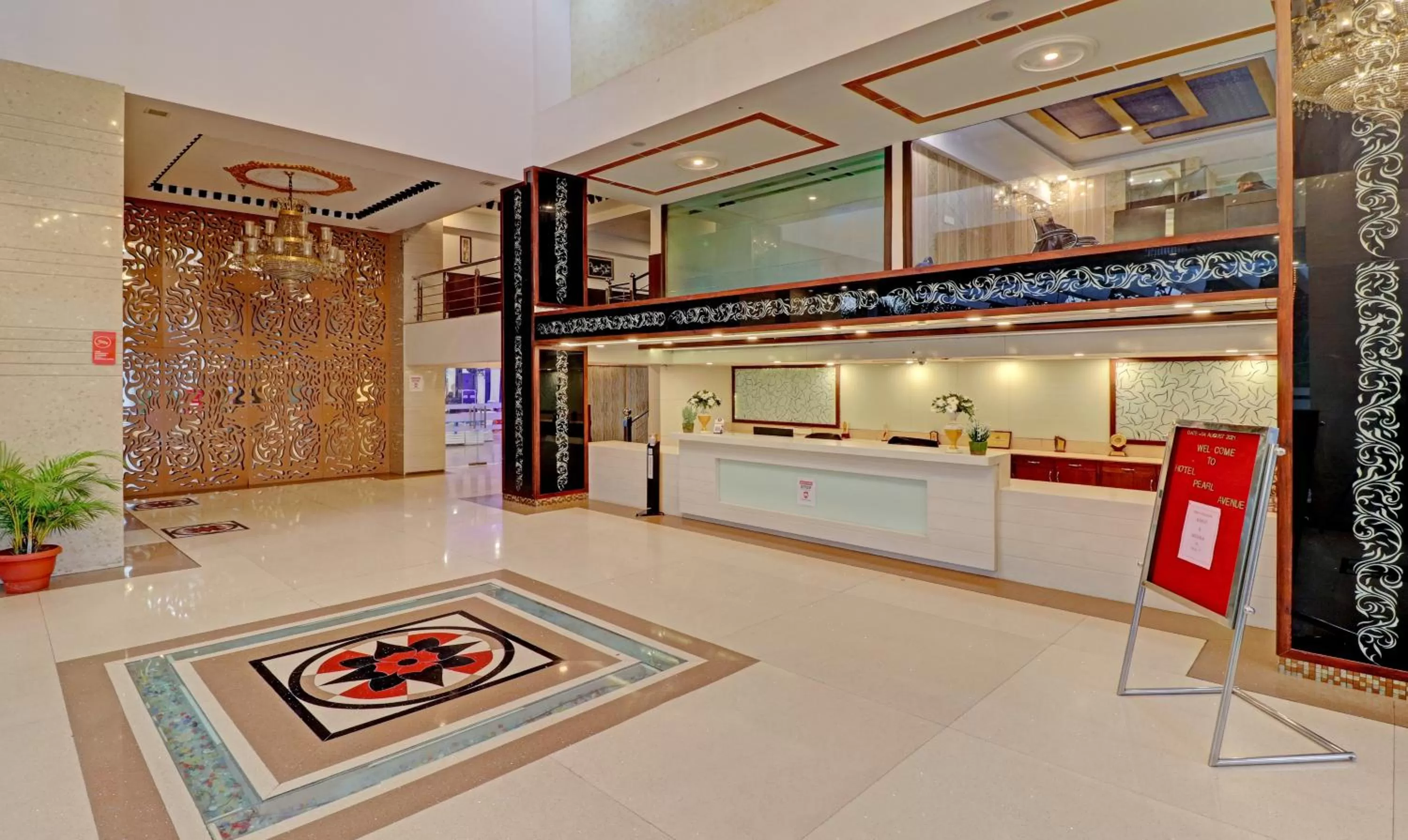Lobby or reception, Kitchen/Kitchenette in Treebo Tryst Pearl Avenue Ring Road