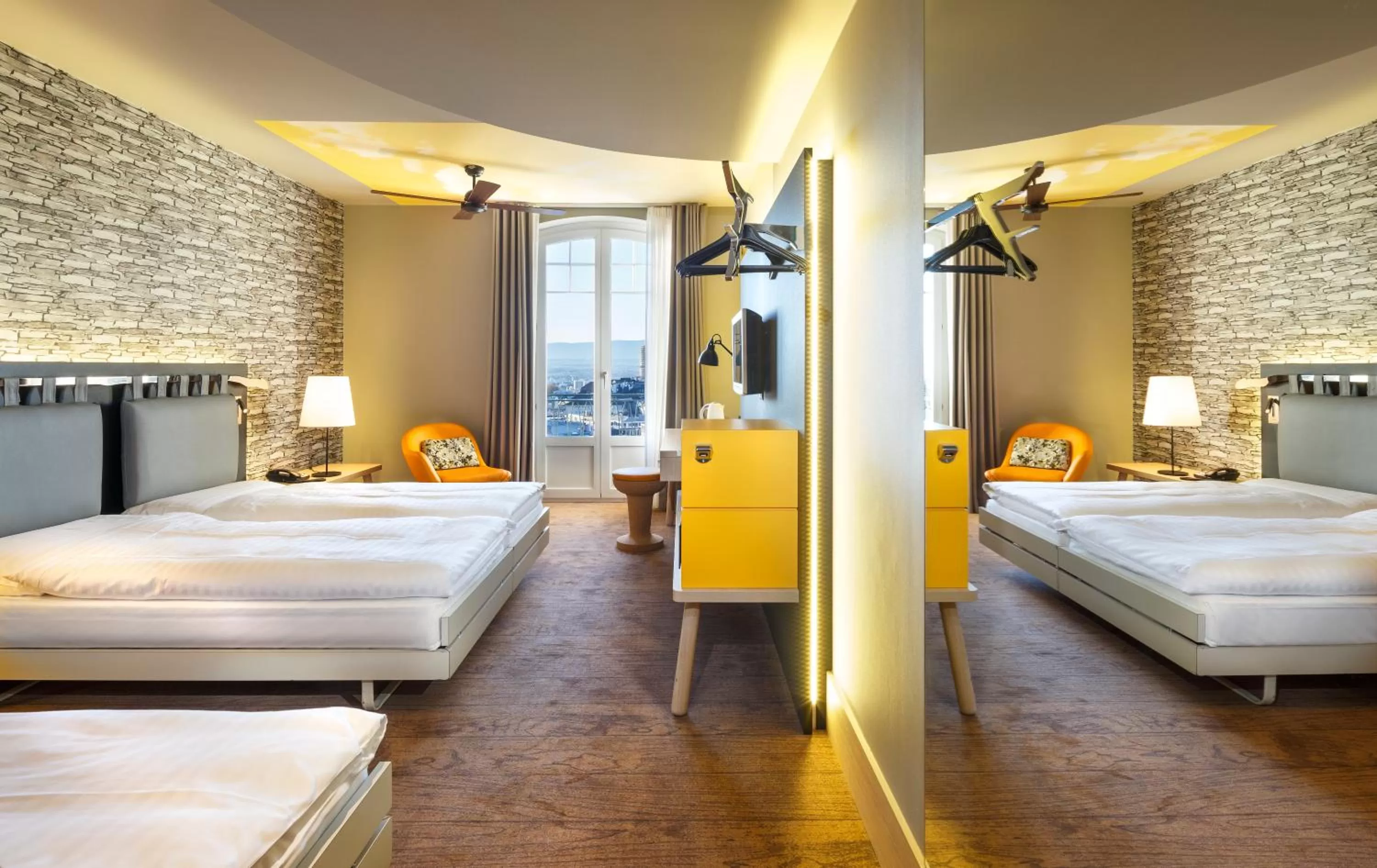 Photo of the whole room, Bed in Swiss Wine by Fassbind