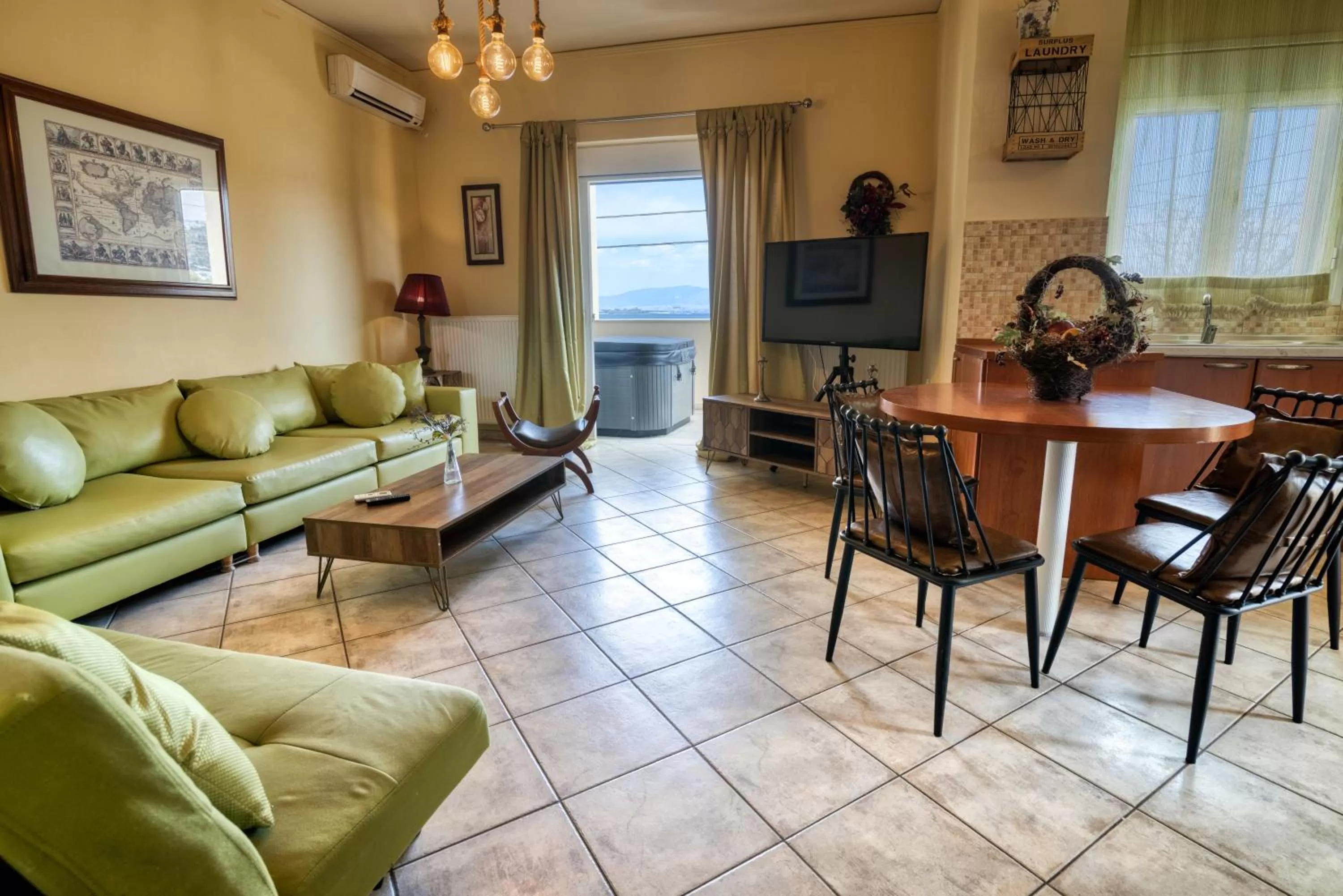 Communal lounge/ TV room in Votsalakia Hotel & Luxury Apartments