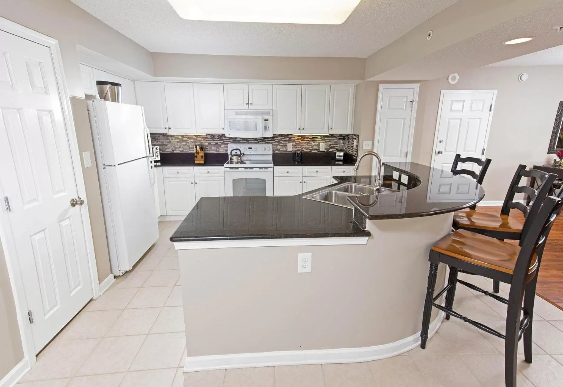 Kitchen or kitchenette in Barefoot Resort Golf & Yacht Club Villas