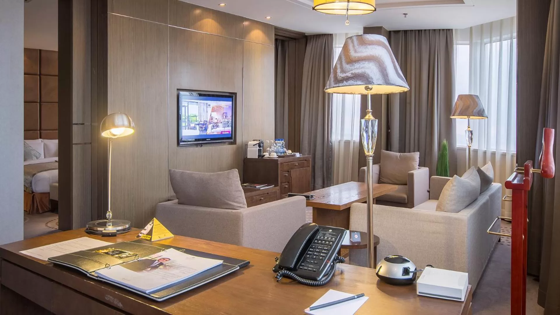 Communal lounge/ TV room in Fleuve Congo Hotel By Blazon Hotels