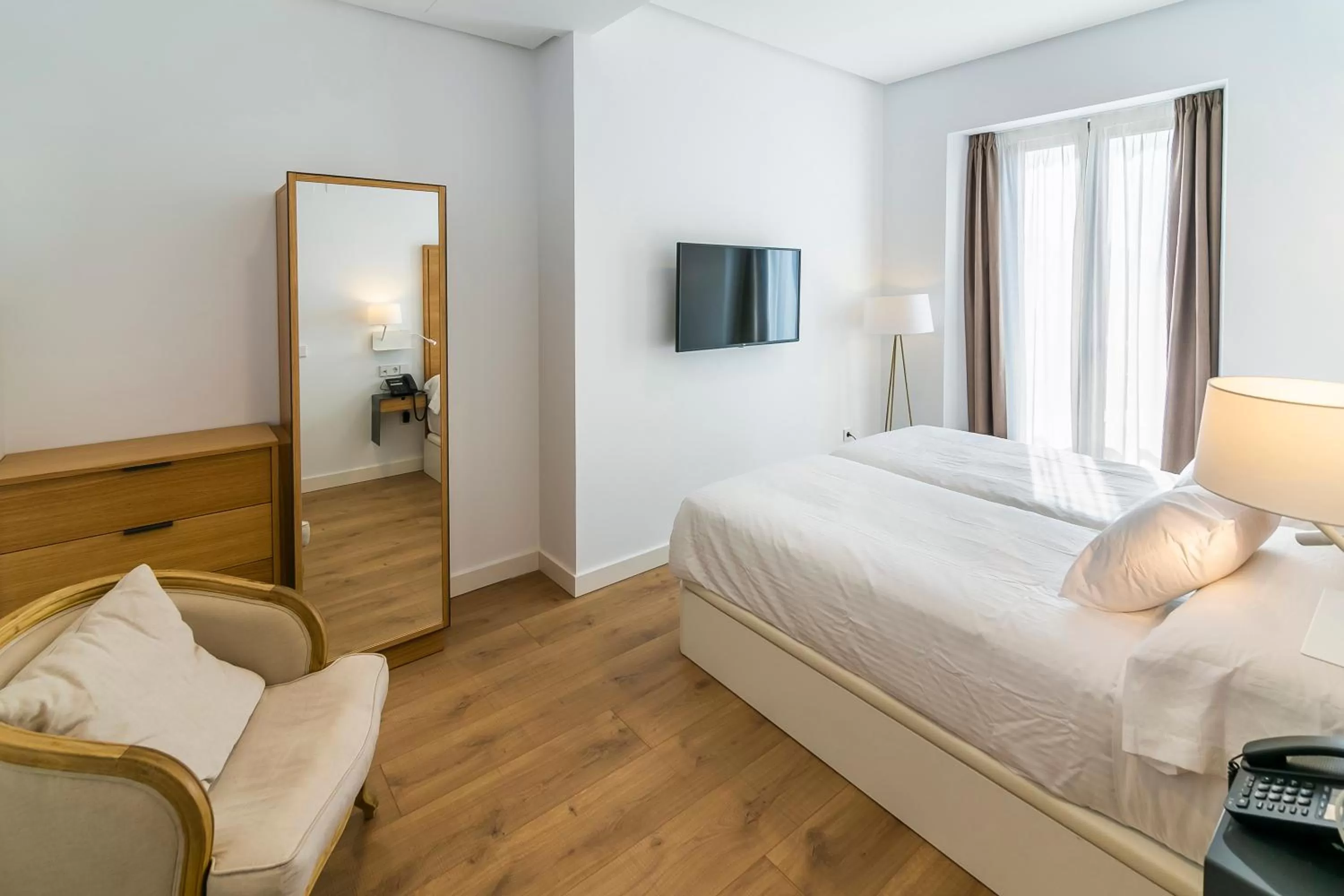 Photo of the whole room, Bed in Aquitania Home Suites