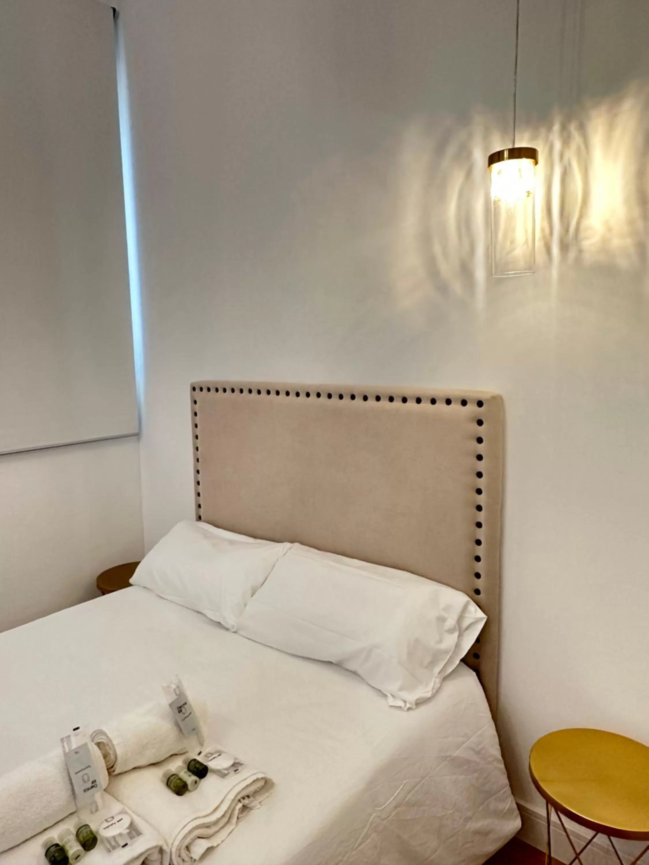 Bed in Siboni Luxury Rooms - Adults Only