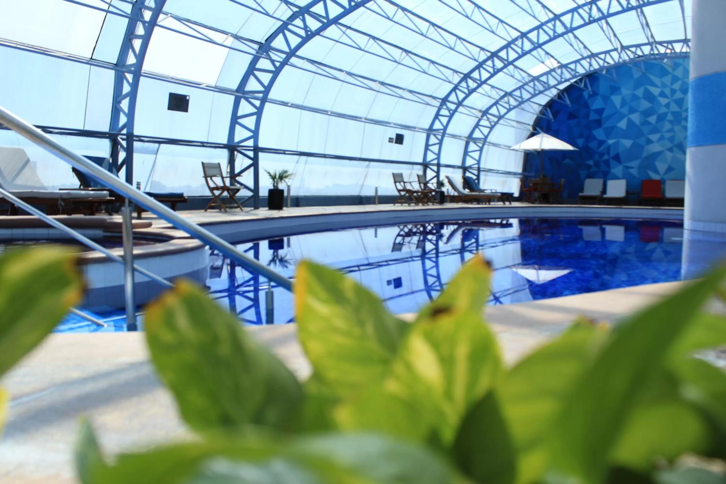 Swimming pool in Holiday Inn Puebla Finsa by IHG