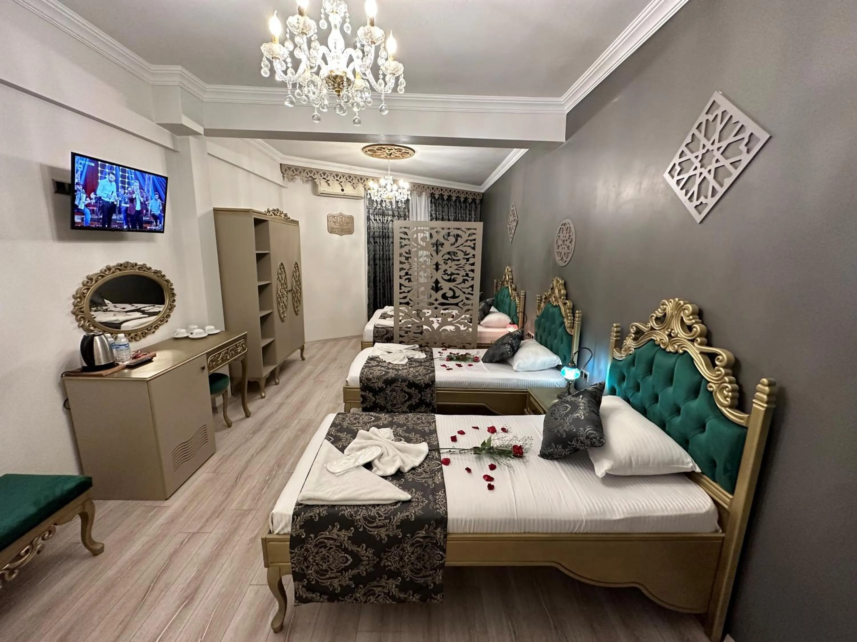 Bed, Seating Area in Ethnica Suites