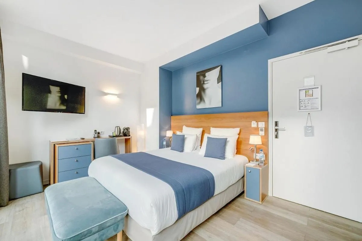 Bed in Hôtel Villa Eiffel Mademoiselle