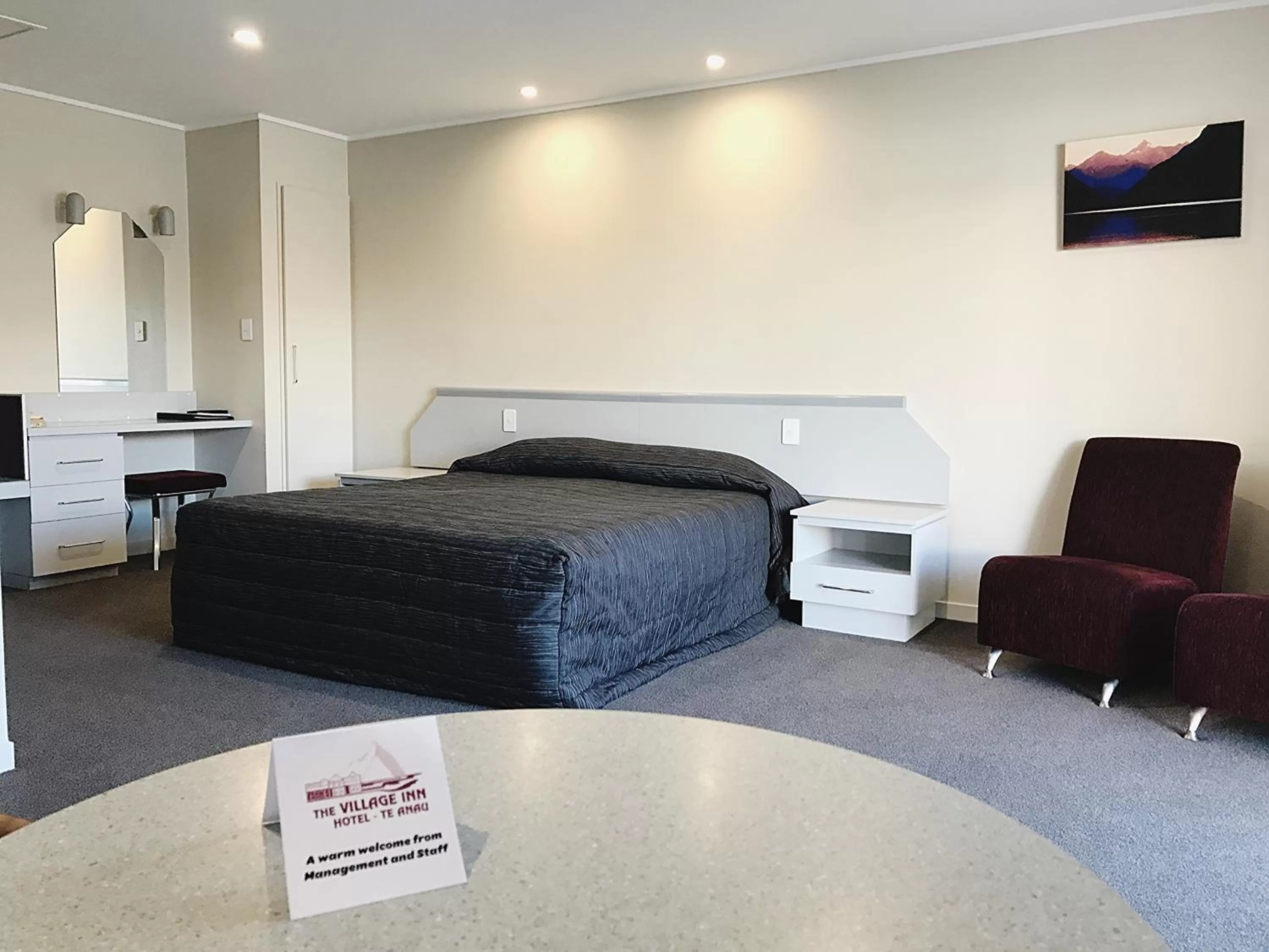 Bed in The Village Inn Hotel