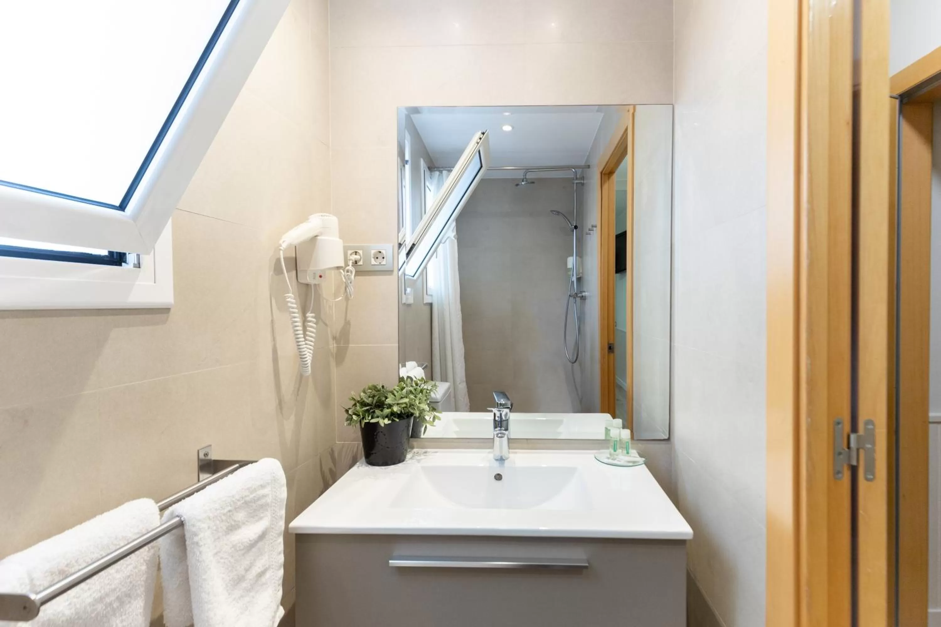 Bathroom in Atica Apartments - by Weflating