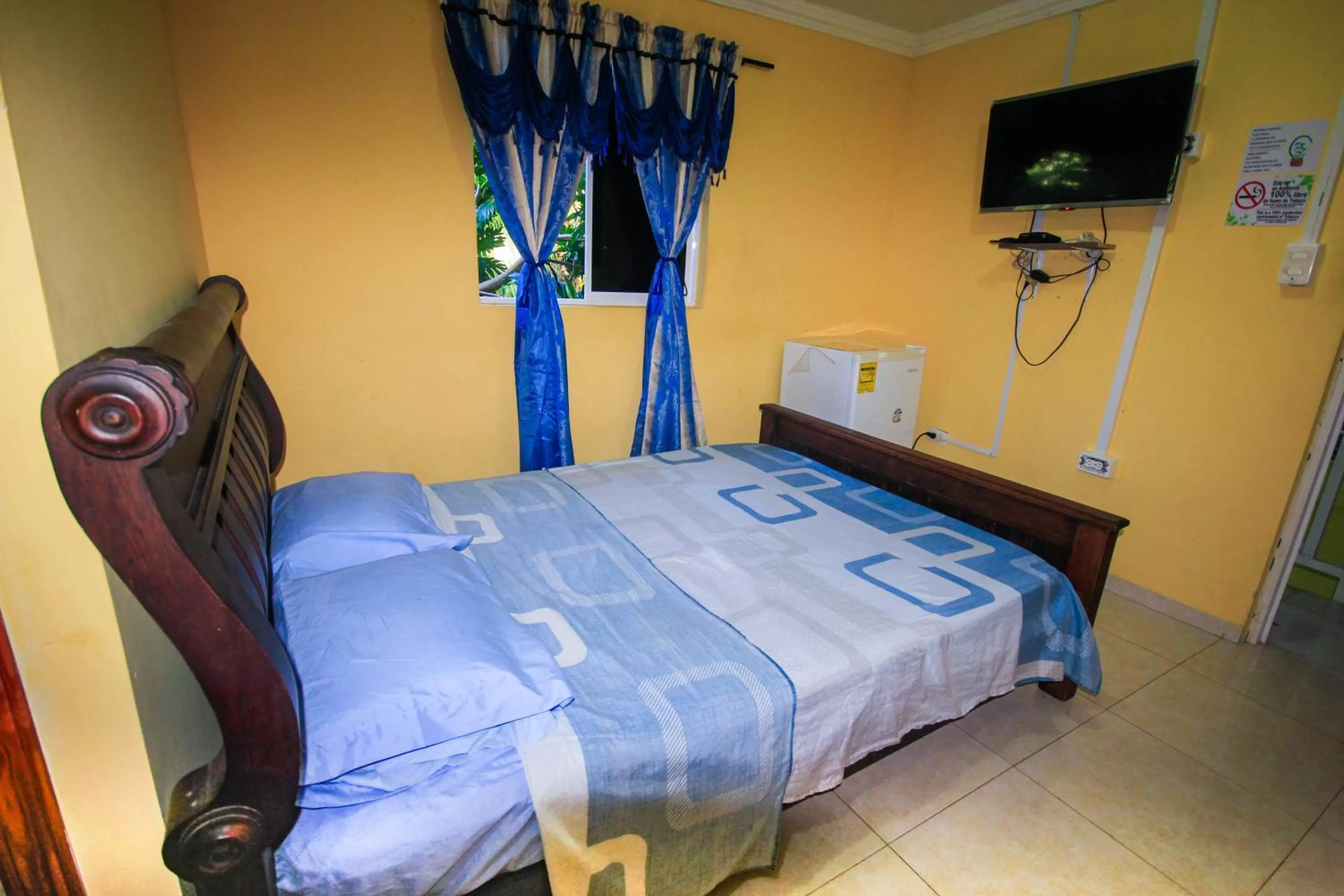 Bed in POSADA NATIVA DERMA´S INN