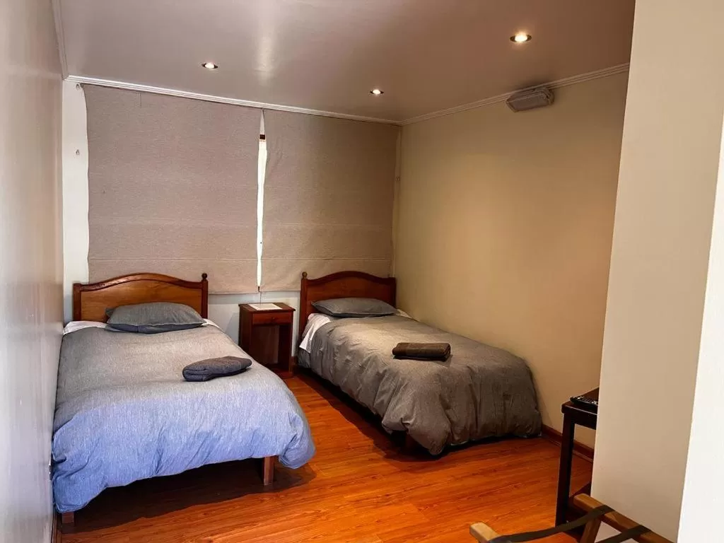 Bed in Hotel y Cabañas Villarrica