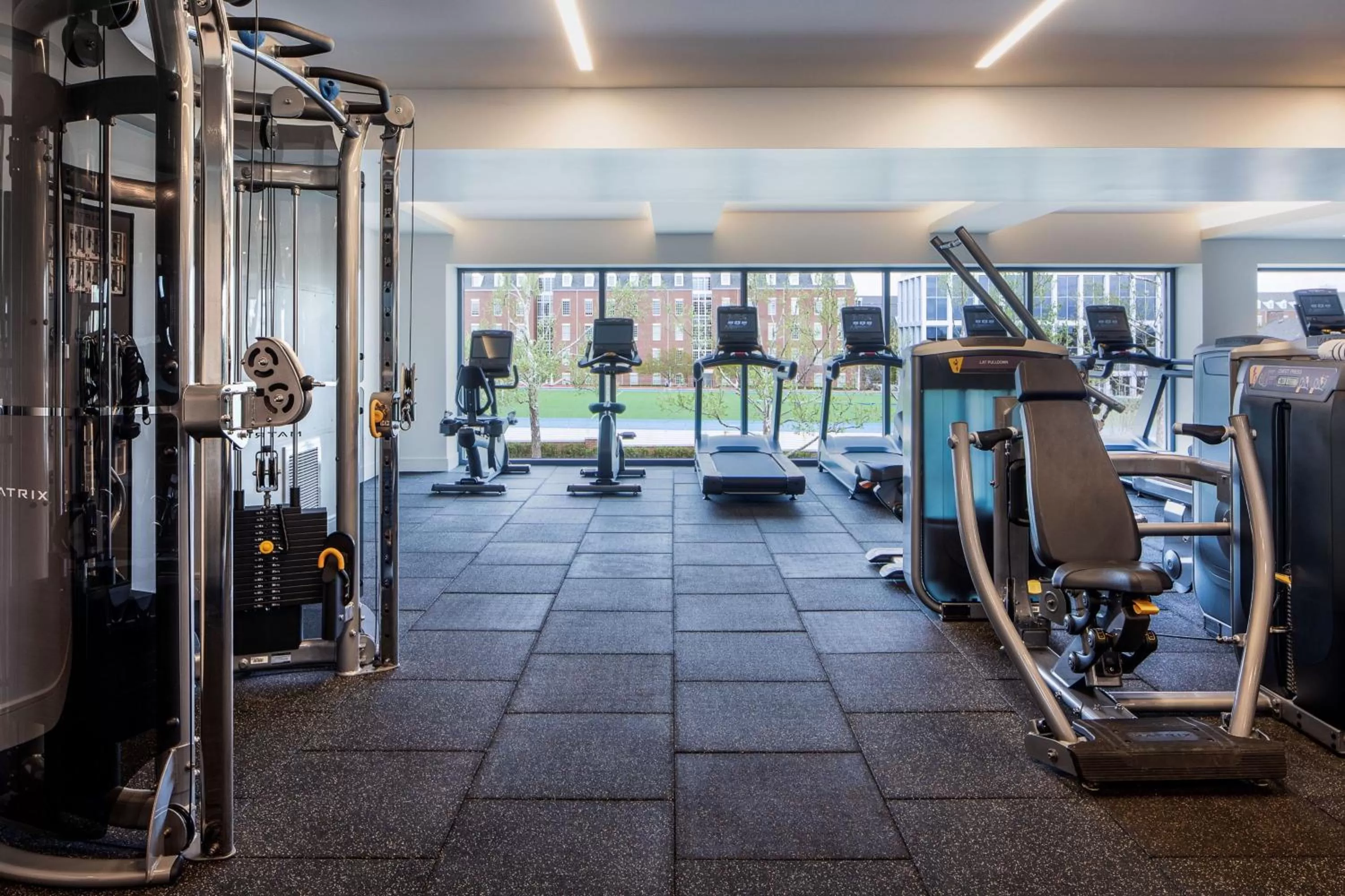 Fitness centre/facilities in The Ellison, Oklahoma City, a Tribute Portfolio Hotel