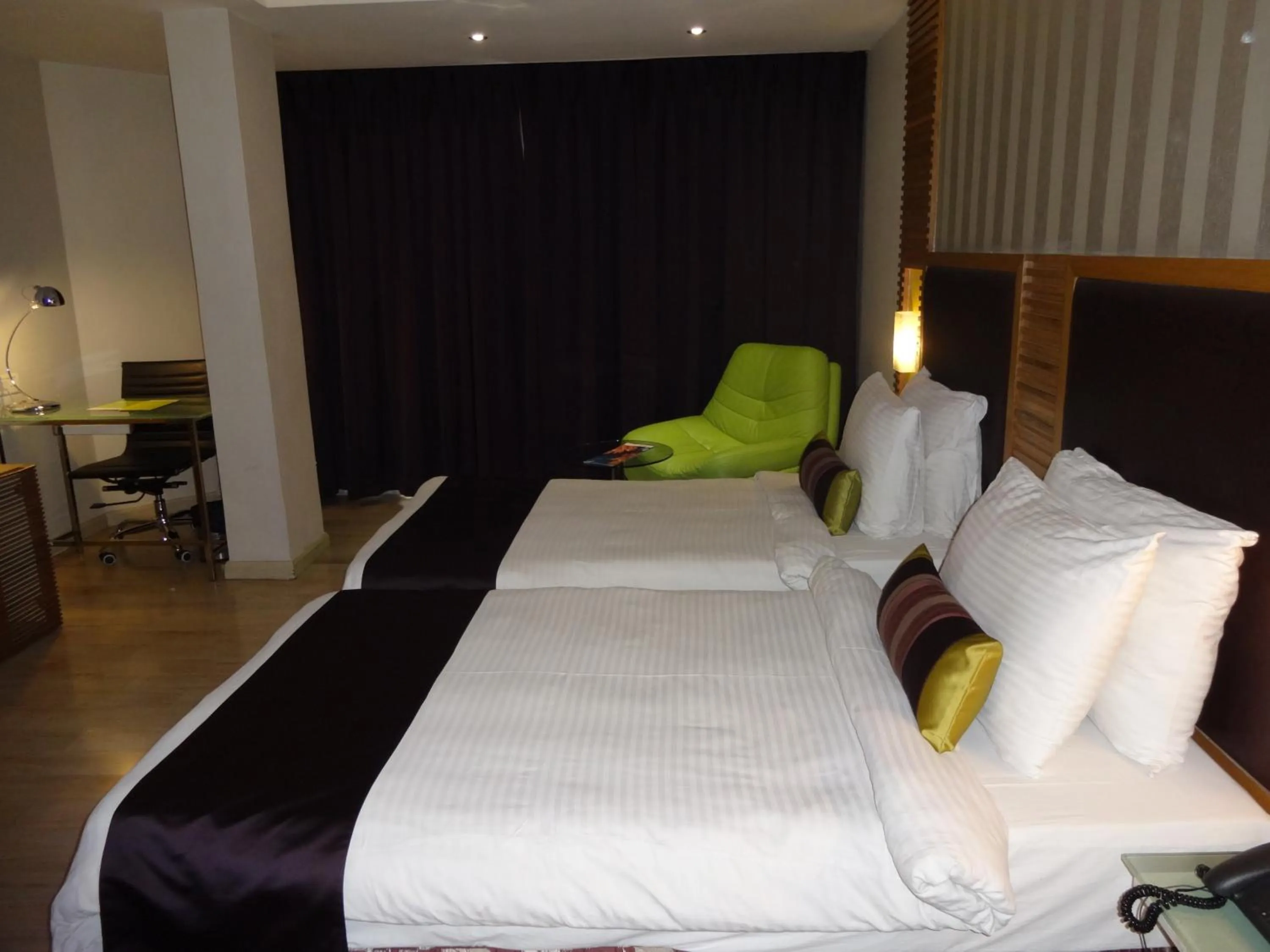 Bed in The Purple Leaf Hotels