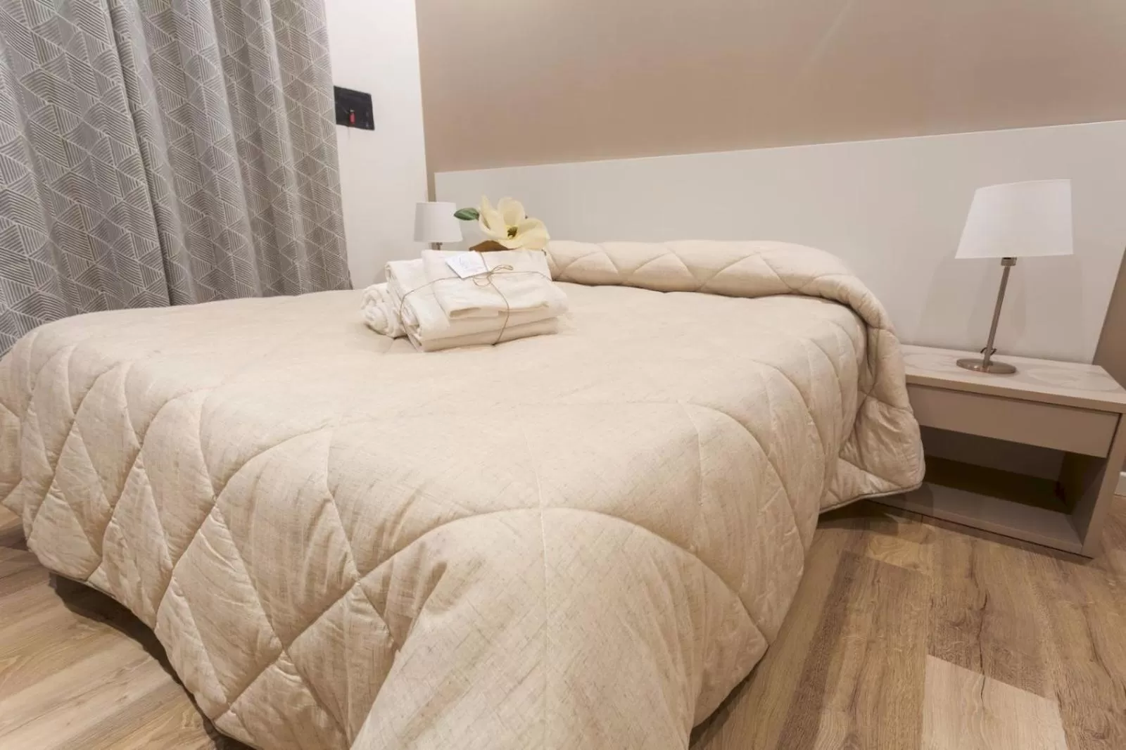 Bed in Due Passi Suite