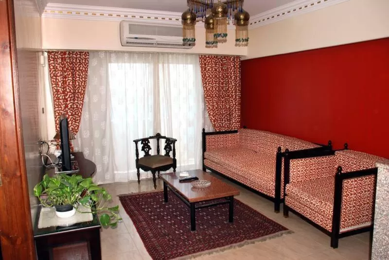 Living room, Bed in Philae Hotel Aswan