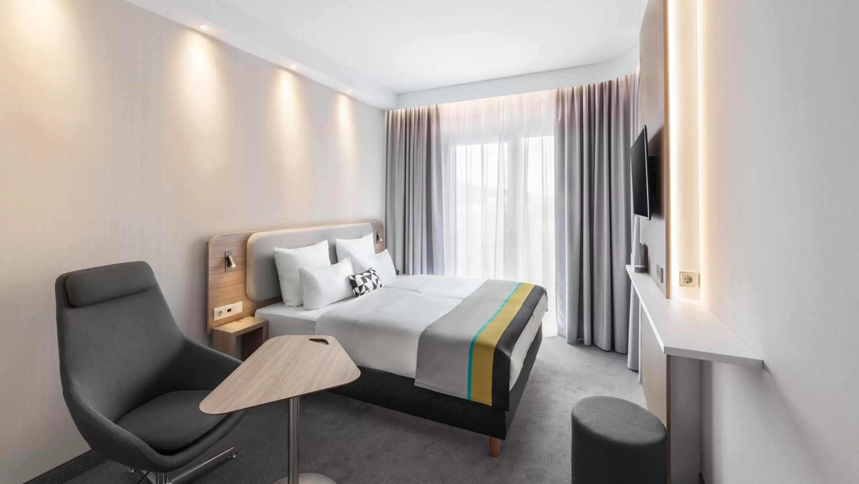 Photo of the whole room, Bed in Holiday Inn Express Munich - City East by IHG