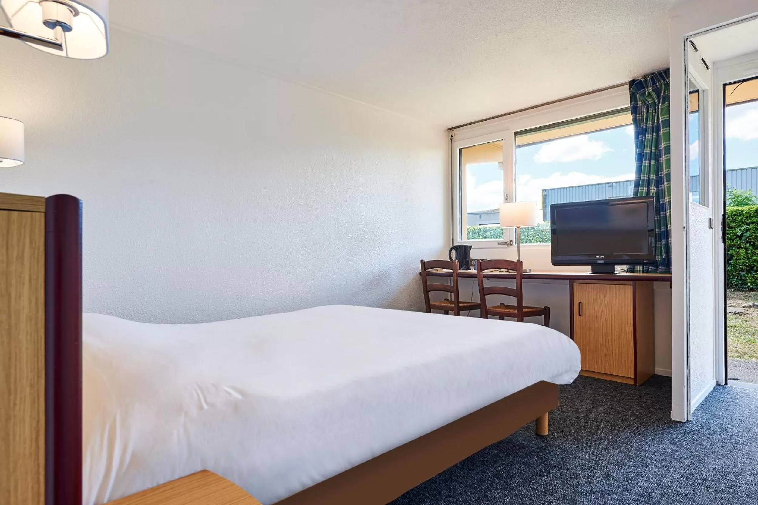 Photo of the whole room, Bed in Kyriad Tarbes Bastillac