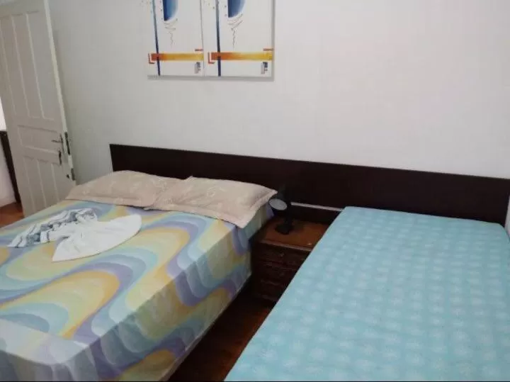 Bed in Pousada Villas