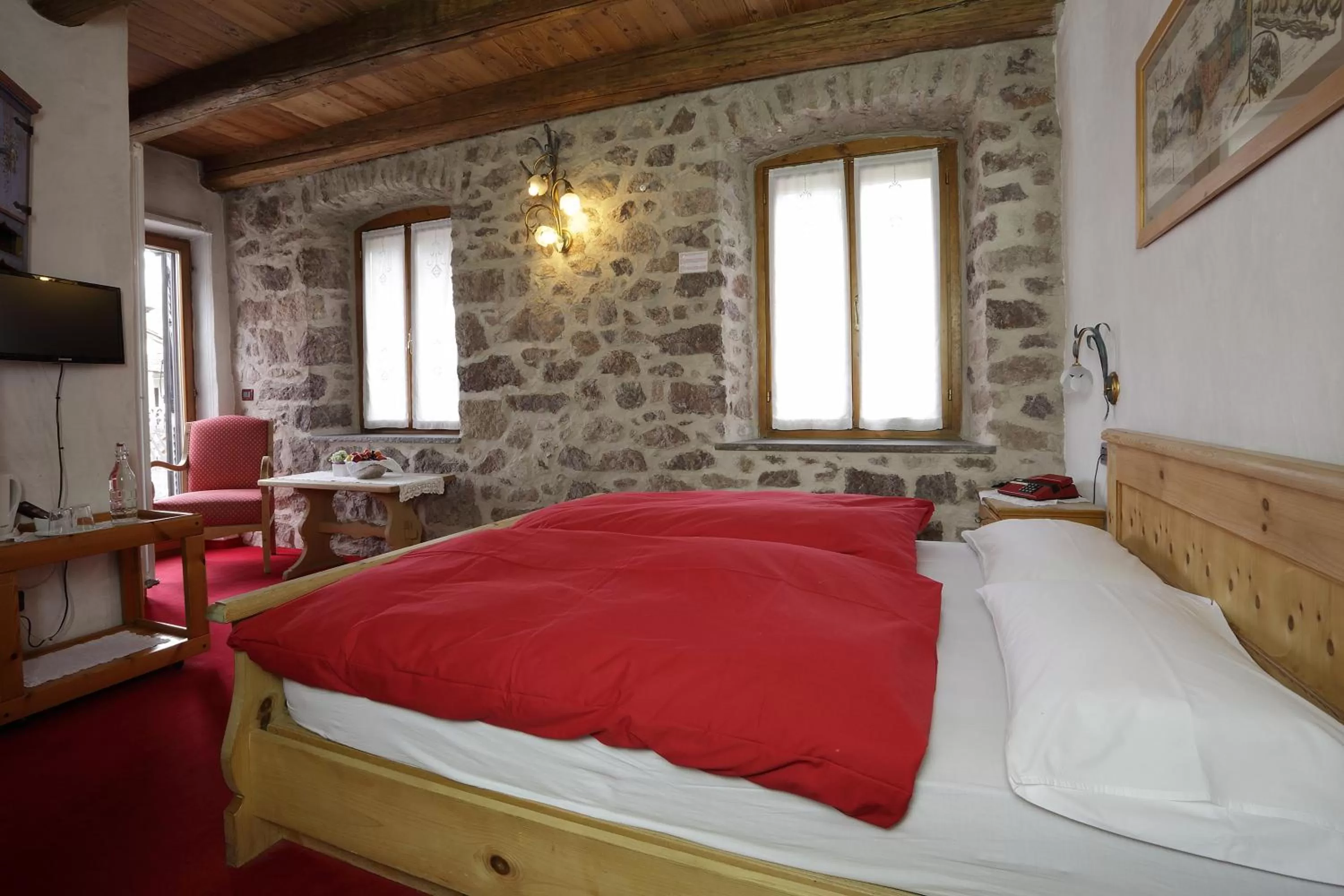 Decorative detail, Bed in Historic Hotel Ristorante La Stua