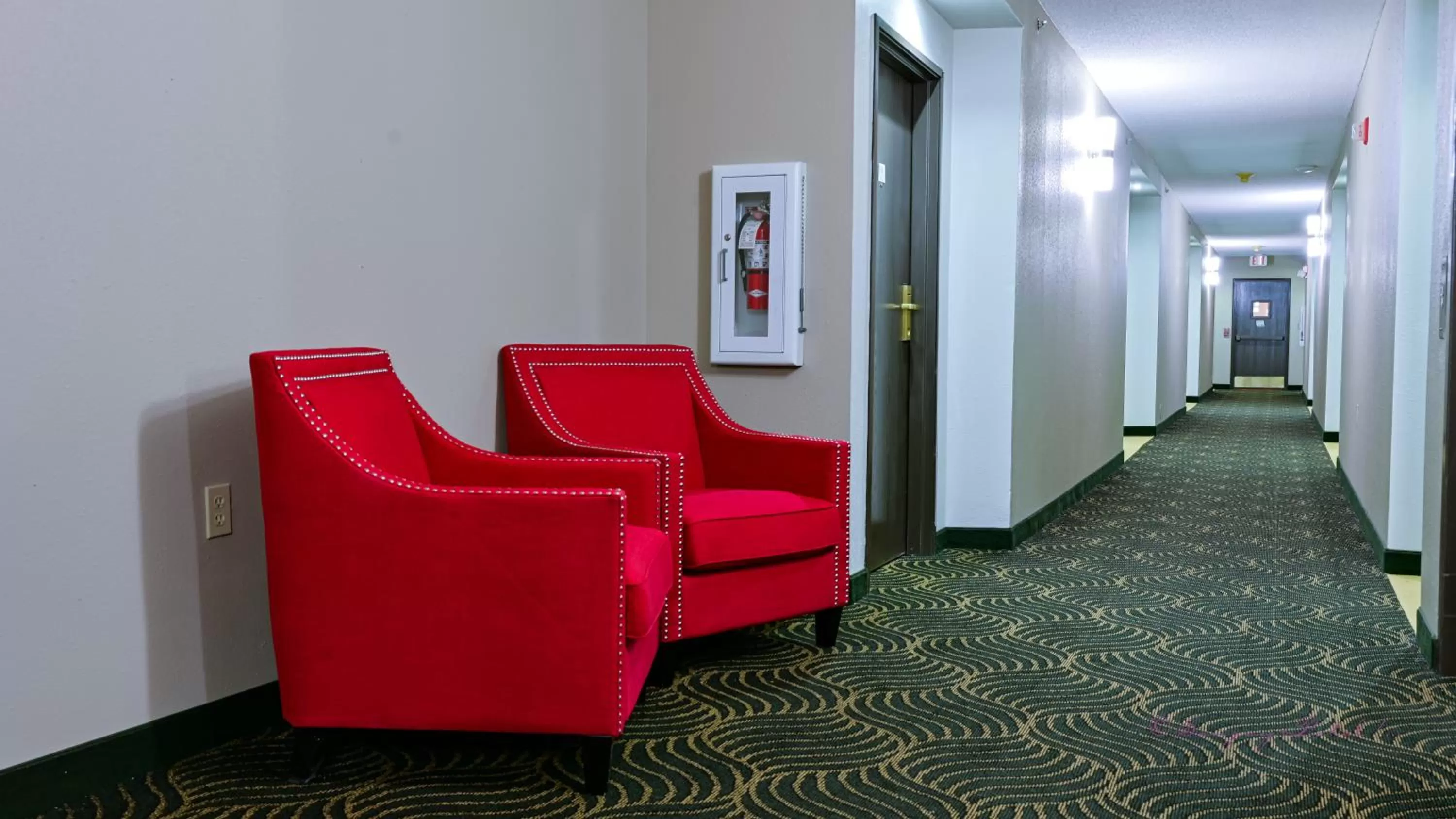 Seating area in Super 8 by Wyndham High Point/Greensboro
