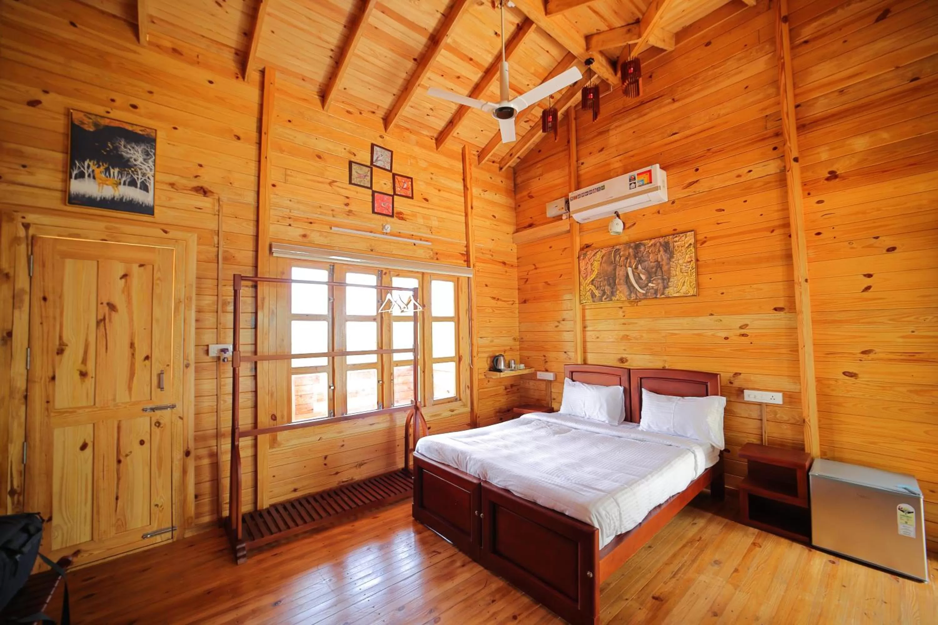 Bed in Woodrose Resort