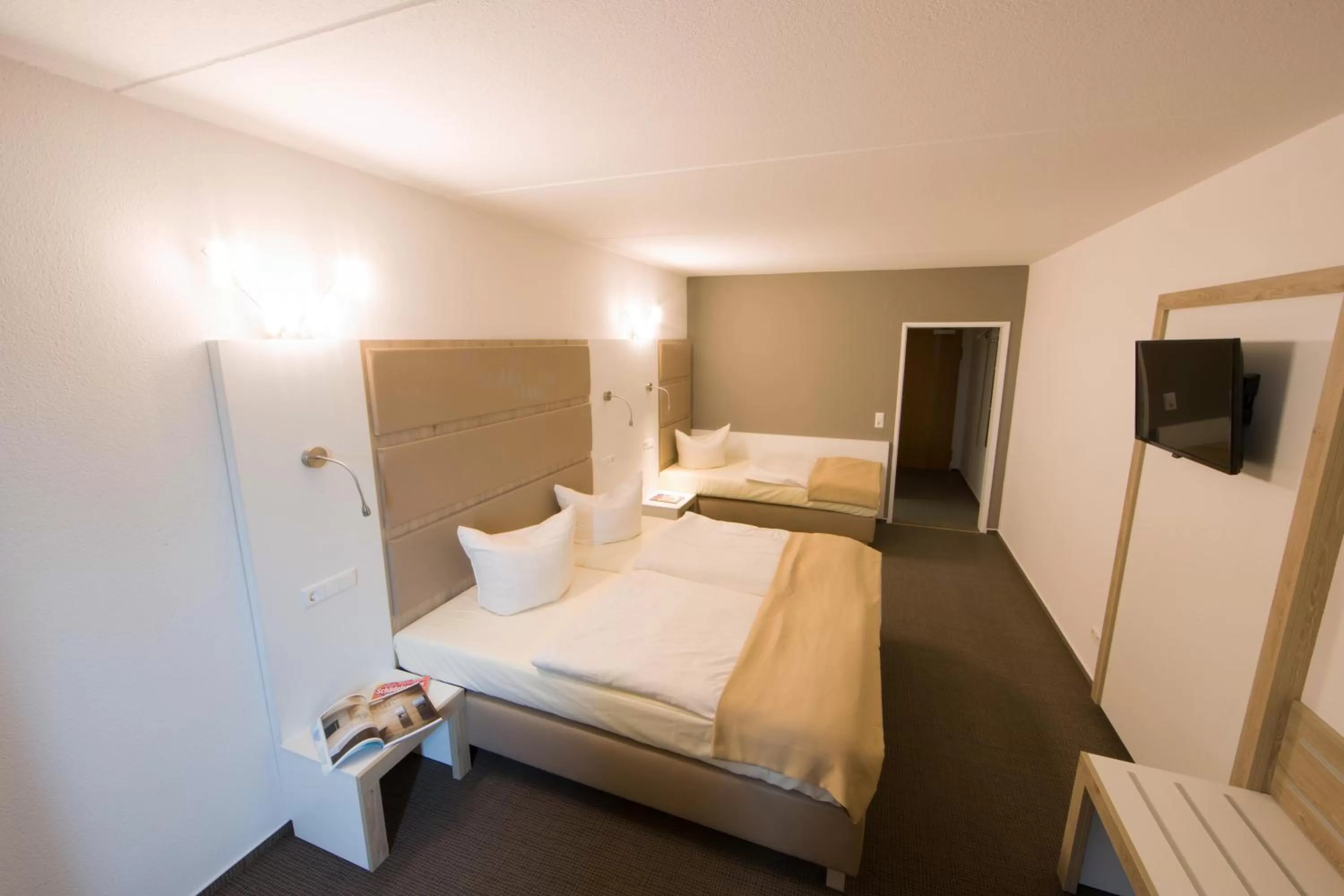 Bed in Confour Hotel