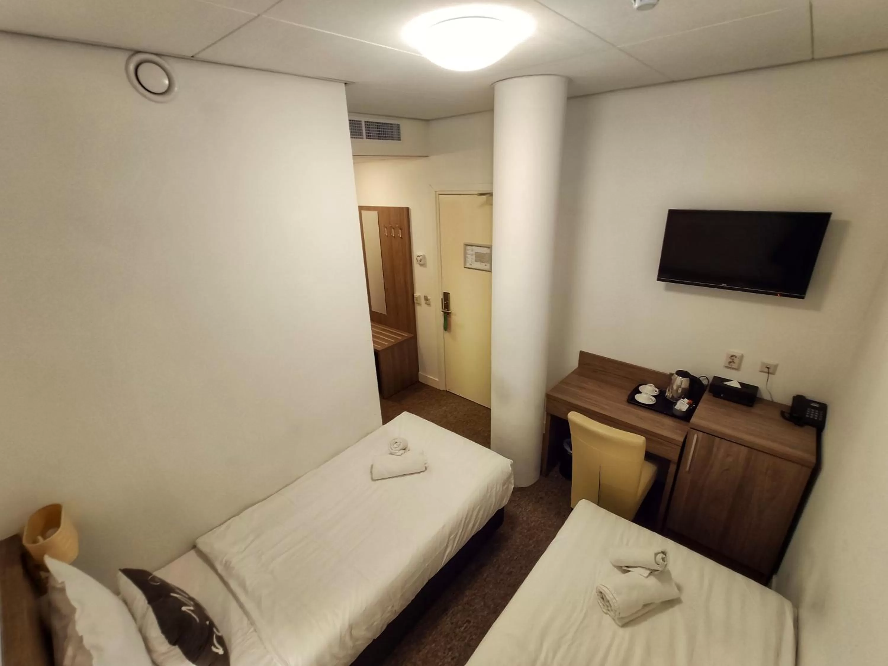 Bed in Hotel Hague Center