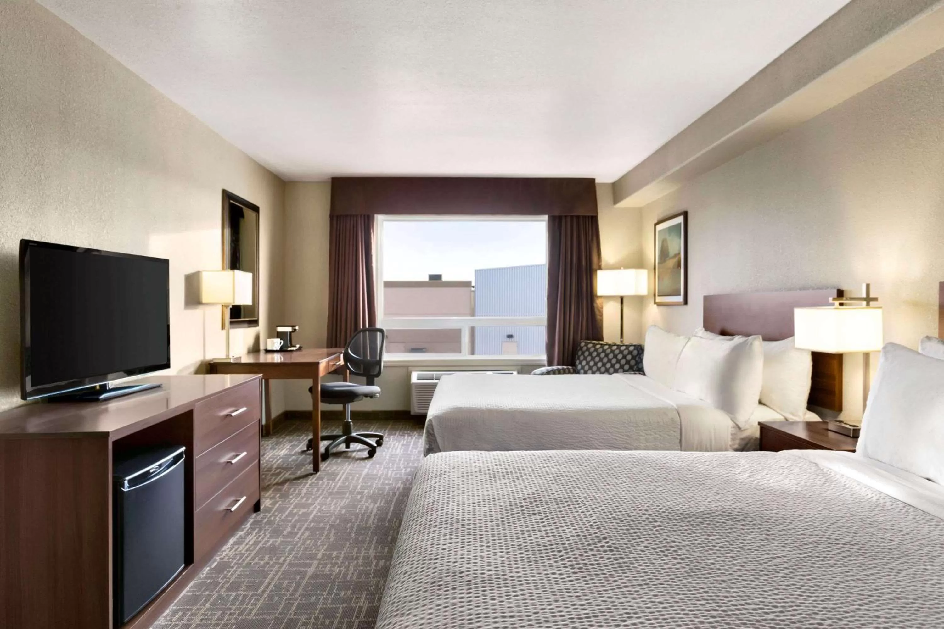 Photo of the whole room, Bed in Days Inn & Suites by Wyndham Yorkton