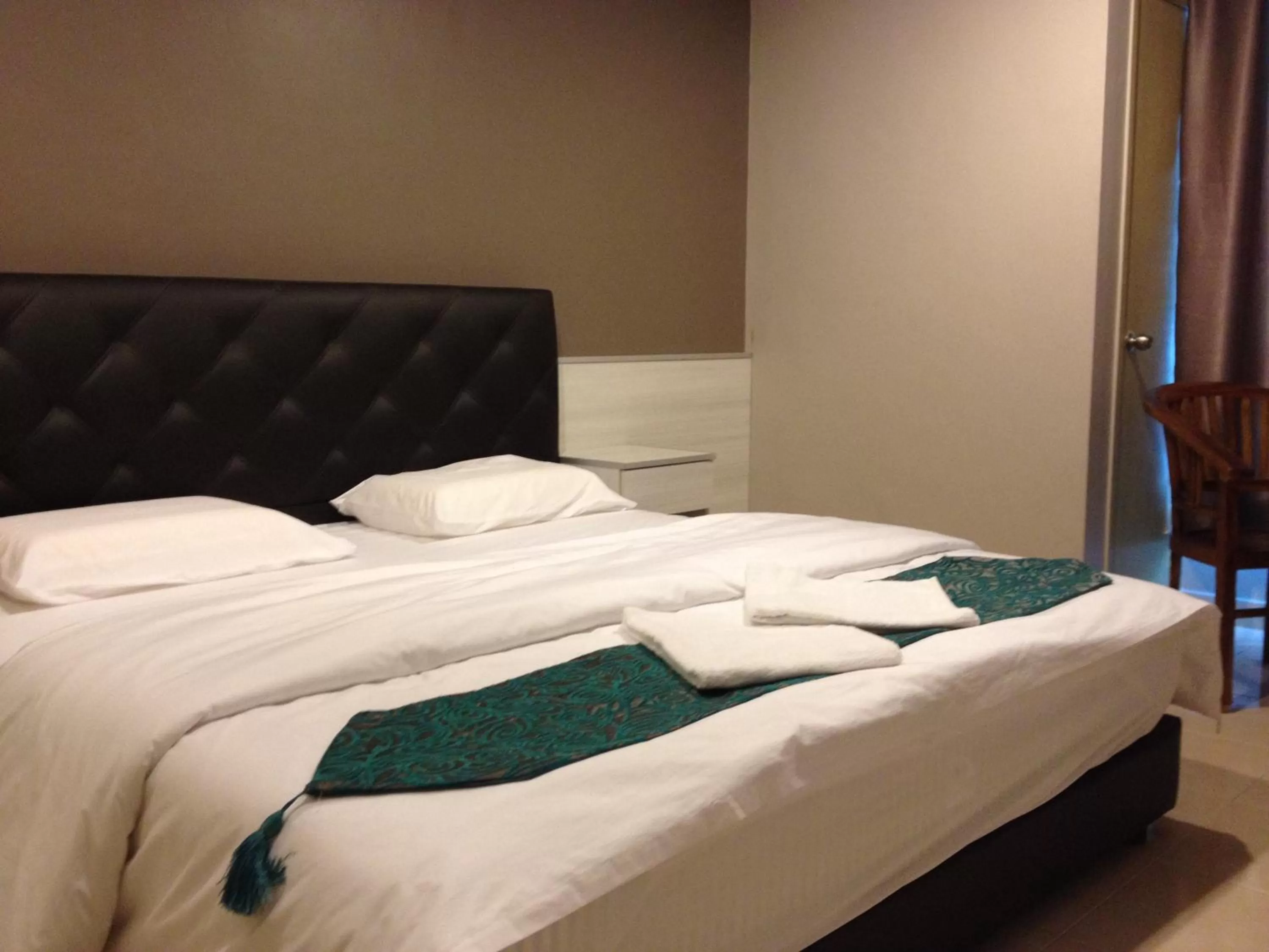 Bed in AERO Star Hotel