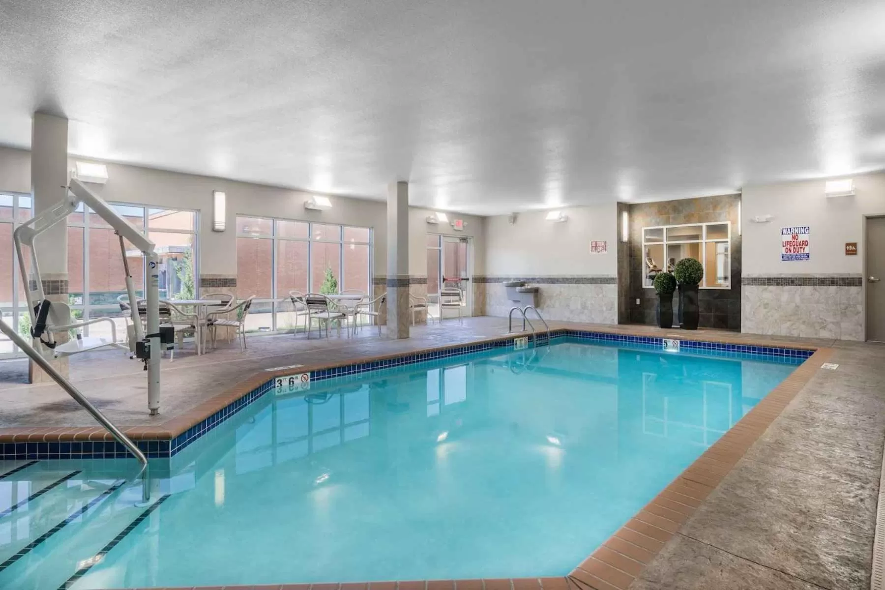Swimming pool in AmericInn by Wyndham Windom