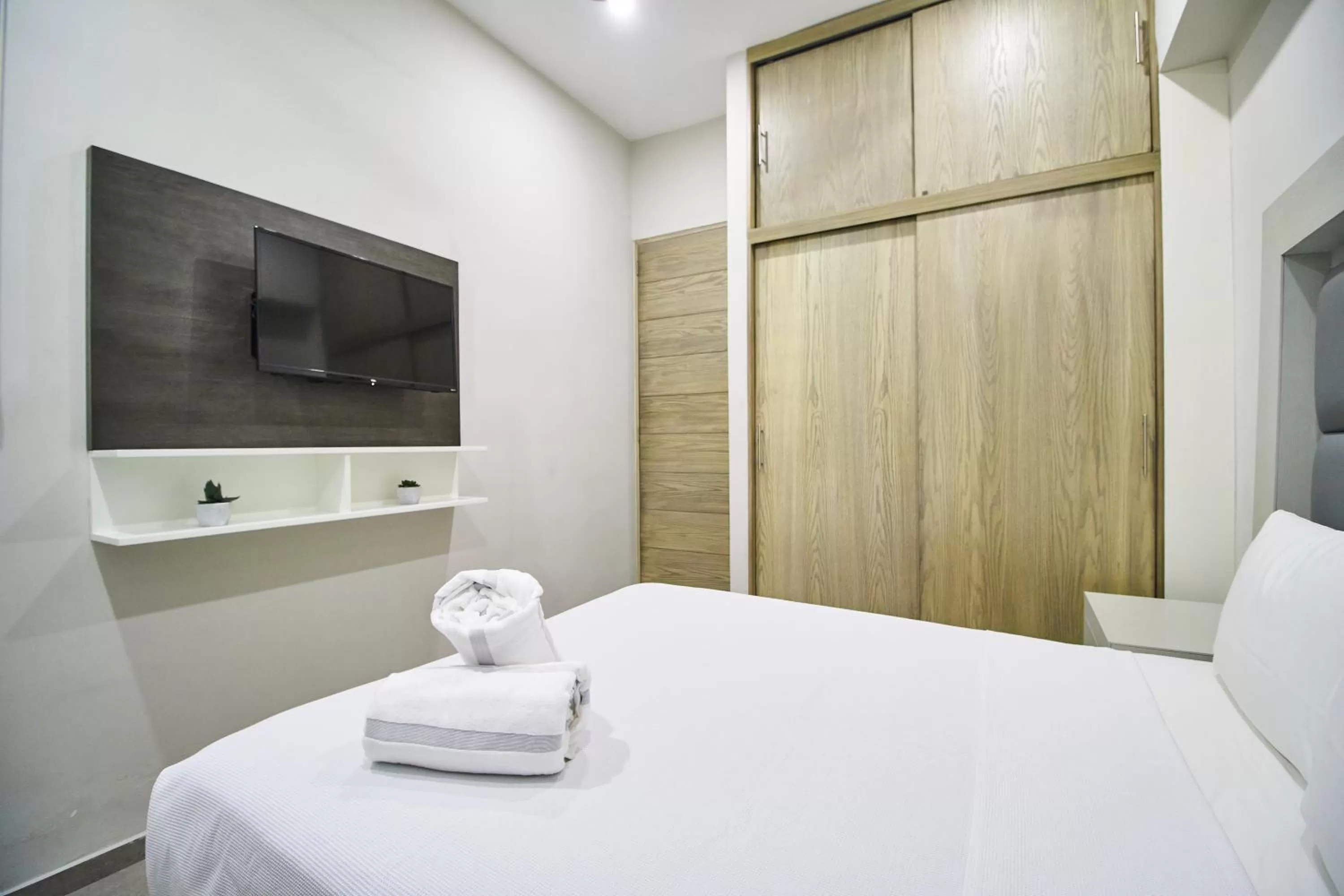 Bed in Torre 42 Playa del Carmen by Lockey